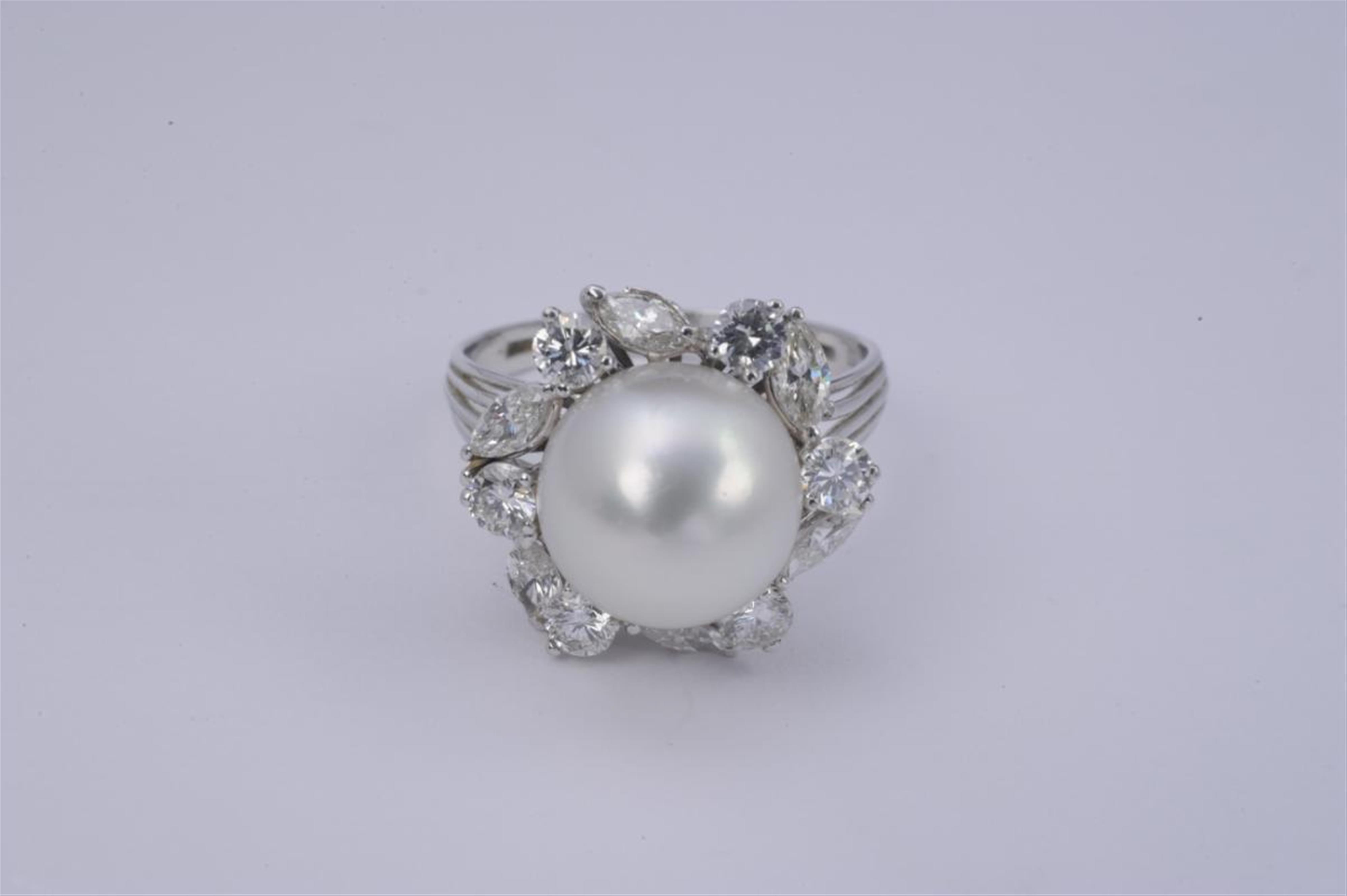 An 18k white gold and pearl floral cluster ring. - image-1