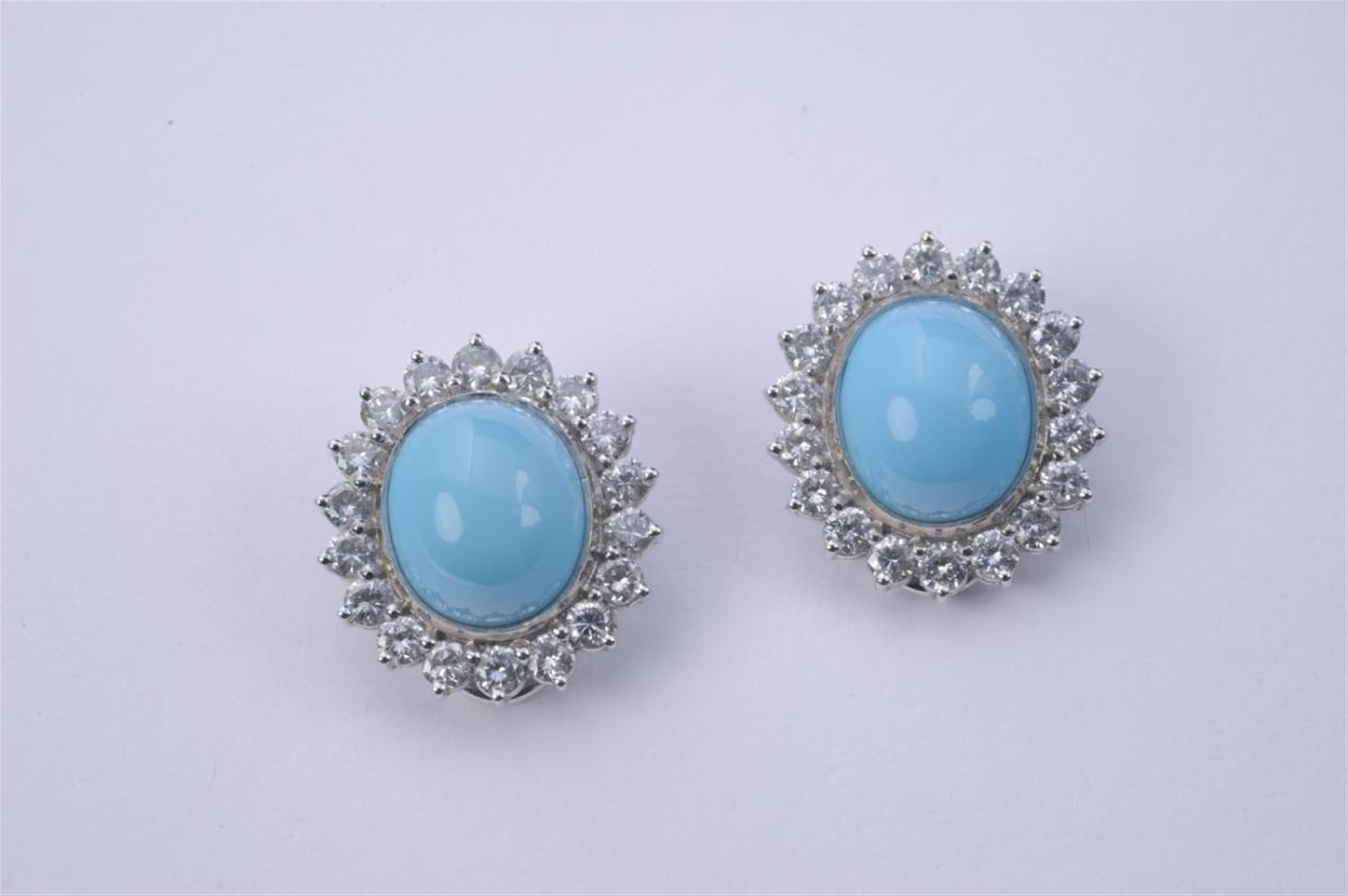 A pair of 18k white gold and turquoise clip earrings. - image-1