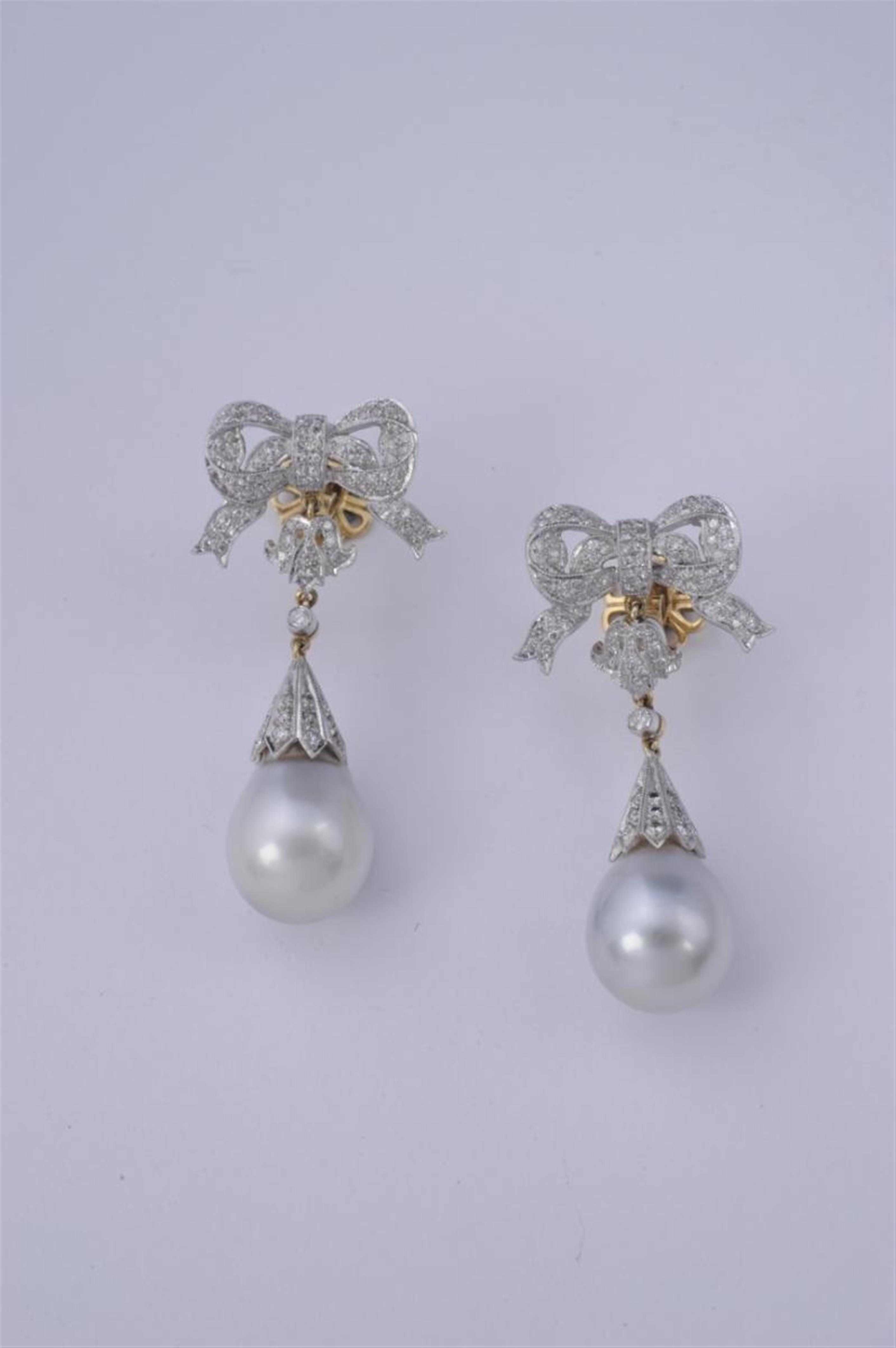 A pair of 18k gold, platinum and pearl Belle Epoqué style pendant earrings - image-1