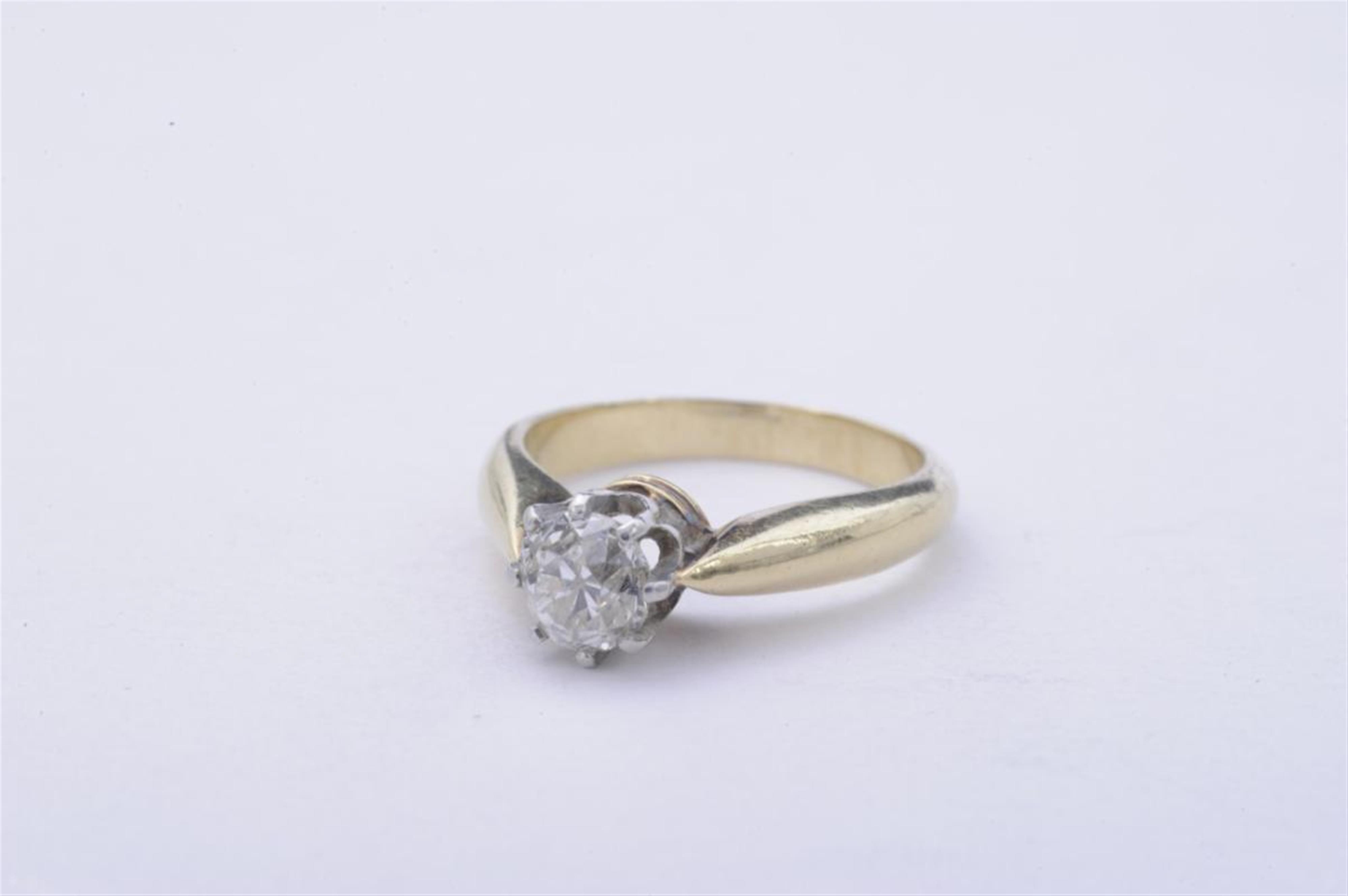 A 14 ct gold and diamond single stone ring. - image-2