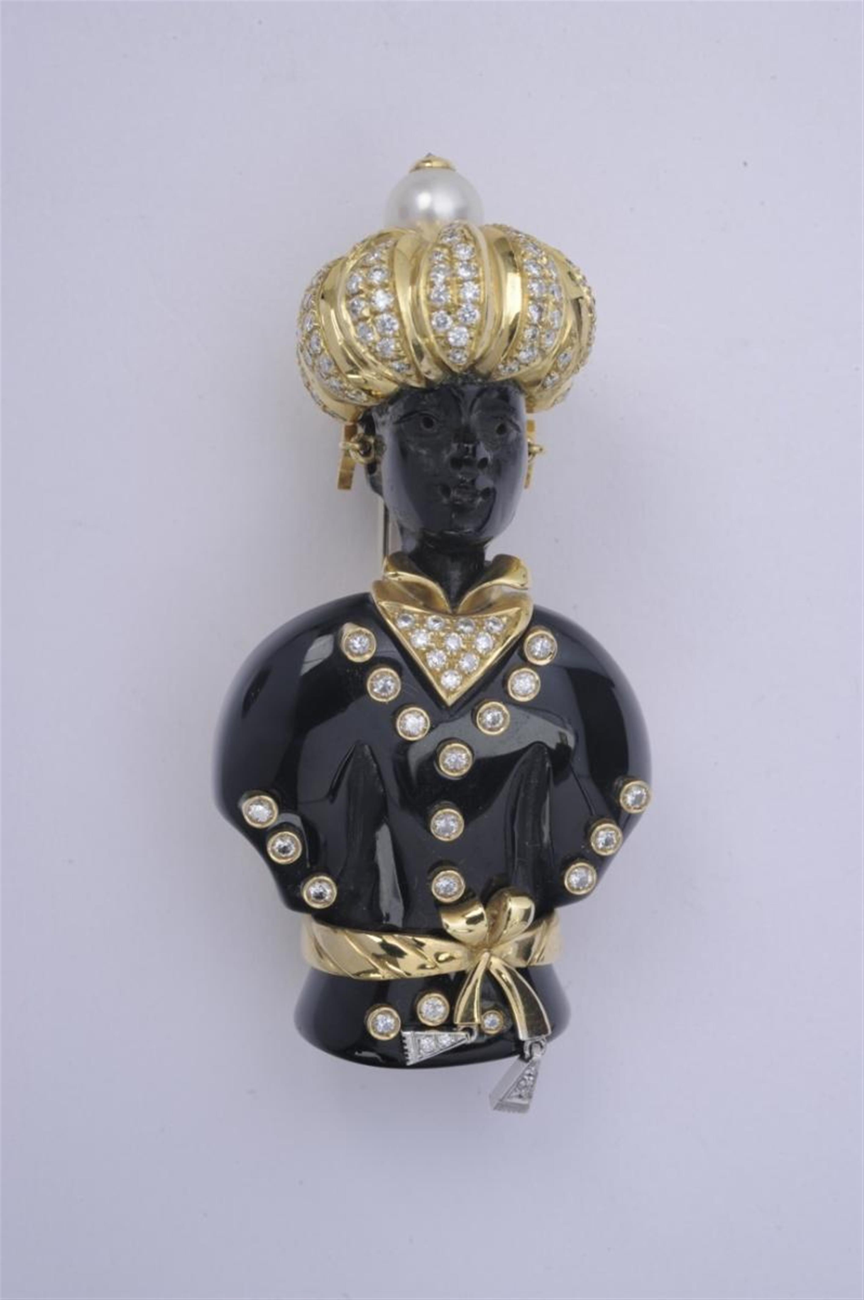 An 18k gold and onyx Venetian "moretto" clip brooch. - image-1