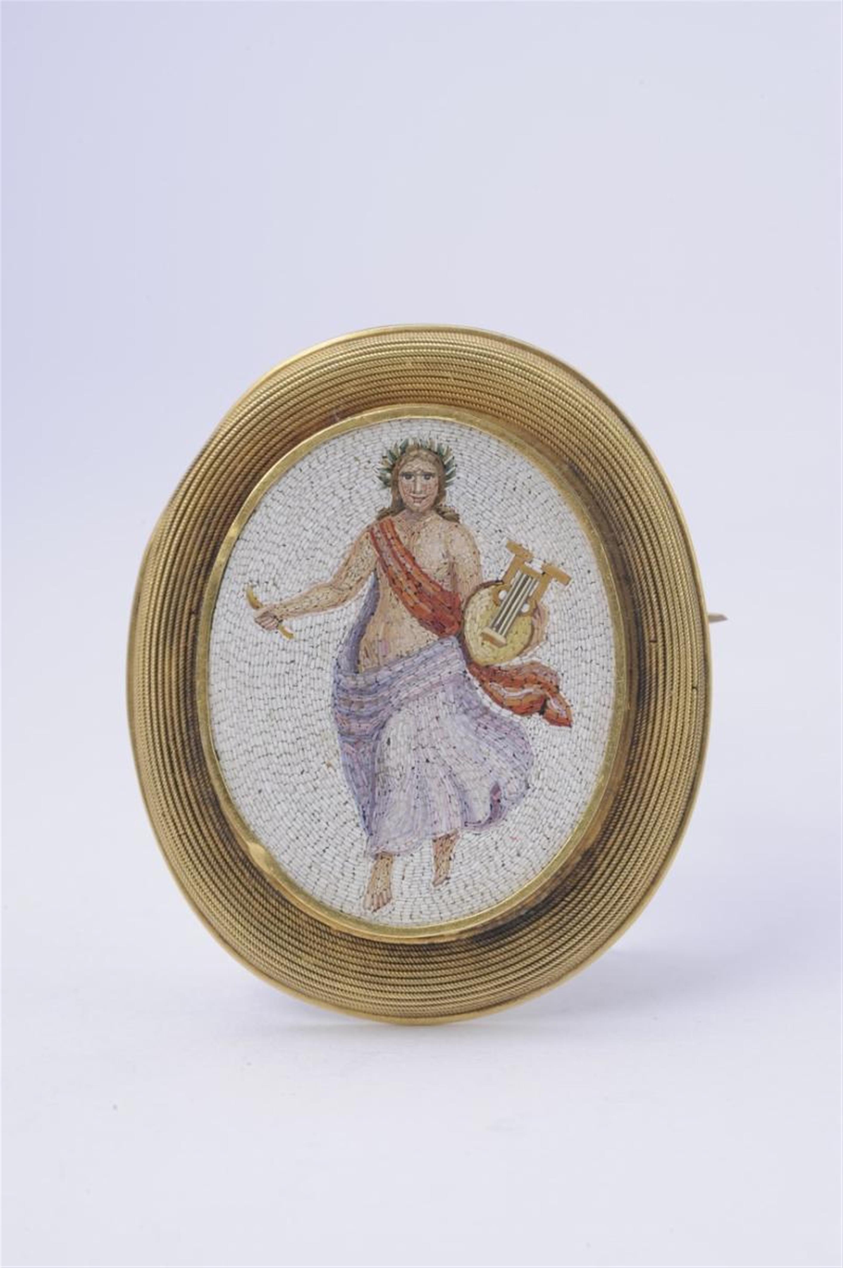 A Roman 18k gold coloured glass micromosaic brooch with a depiction of Apollo. - image-1