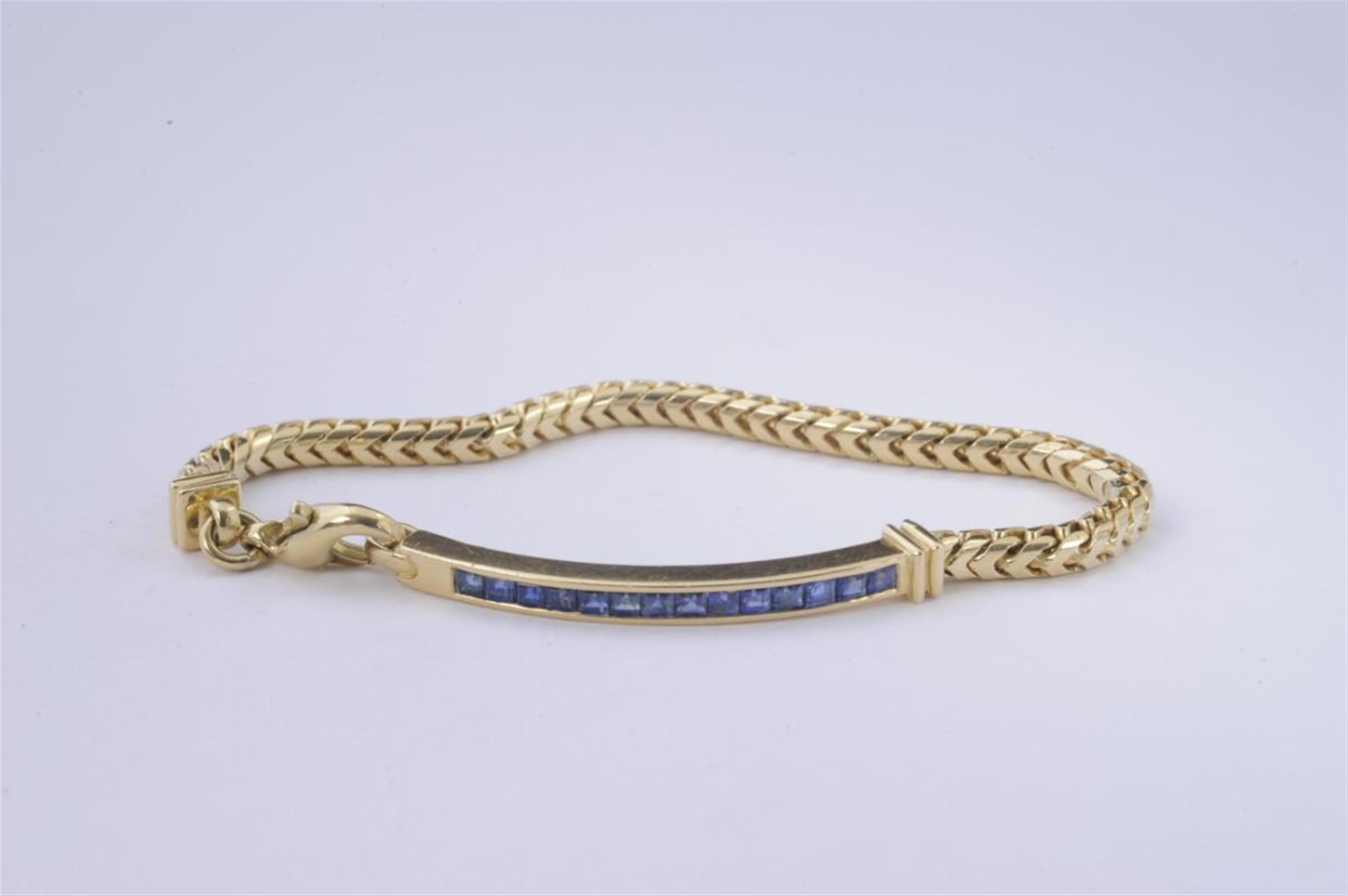 An 18k gold and sapphire bracelet - image-1