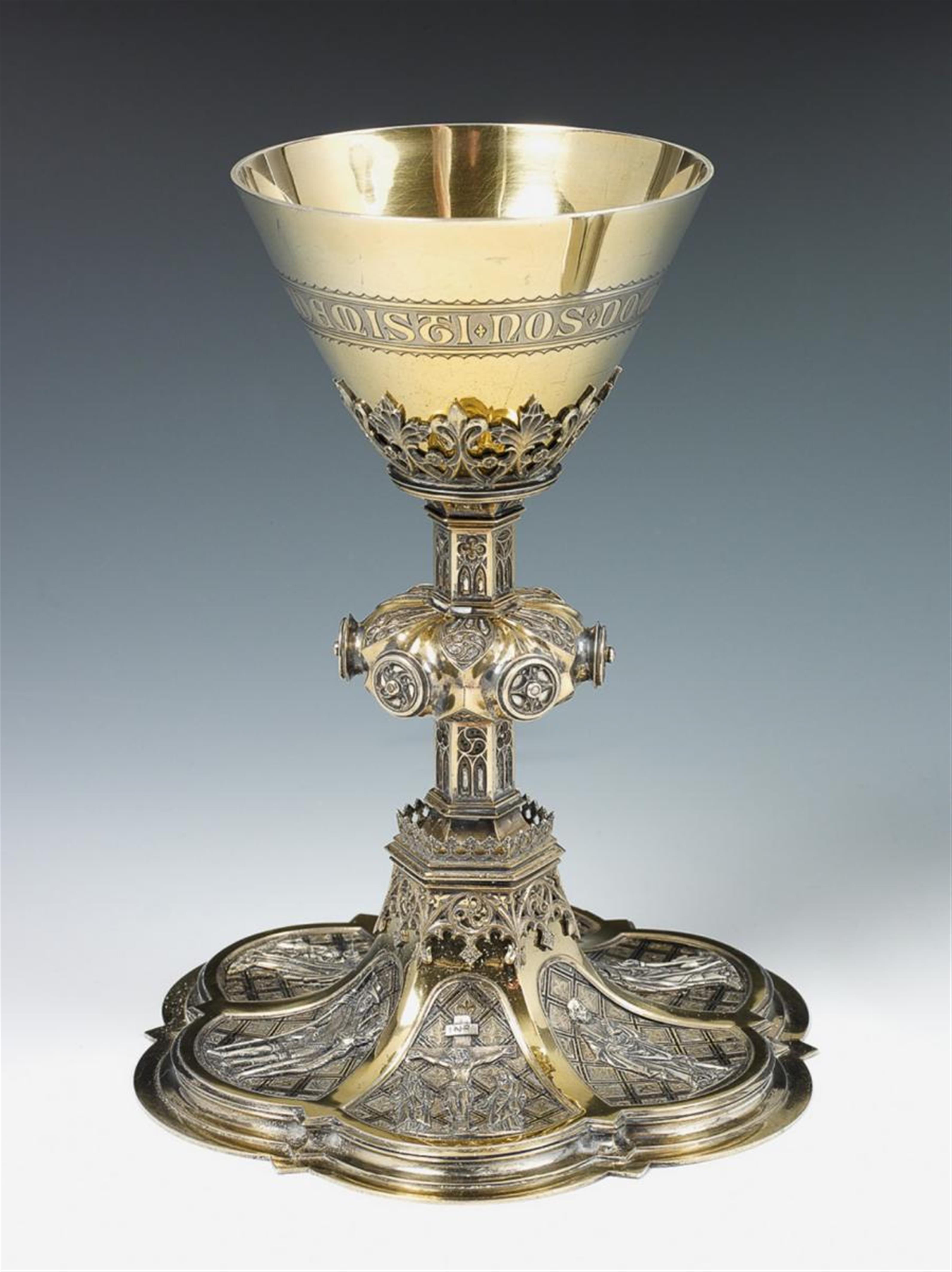 A Cologne silver partially gilt Gothic revival communion chalice. With a 19th C. French silver paten. Marks of Franz Xaver Hellner, 1898. - image-1