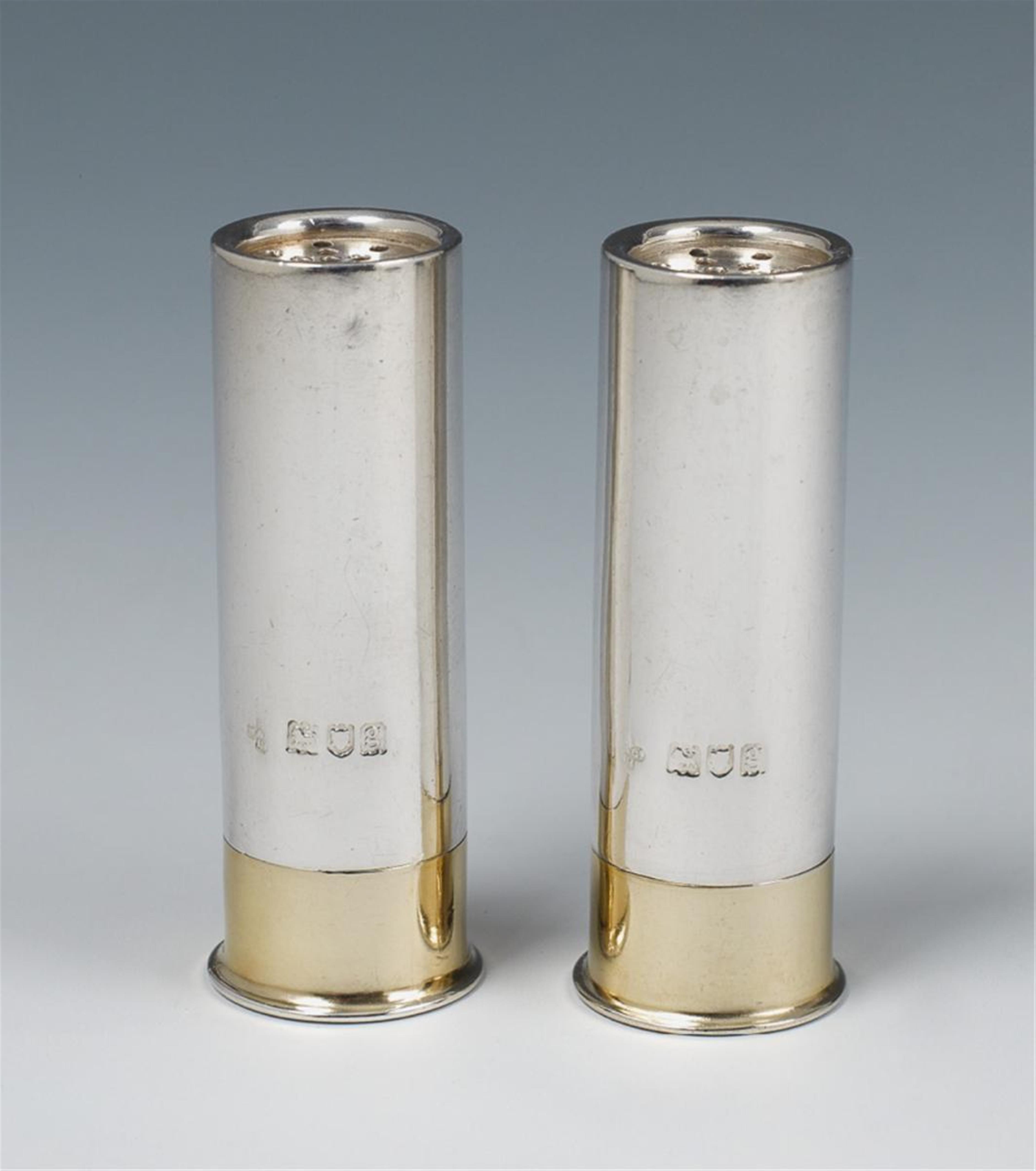 A pair of London silver partially gilt salt casters formed as shotgun cartridges. Marks of Horace Woodward & Co., 1902. - image-1