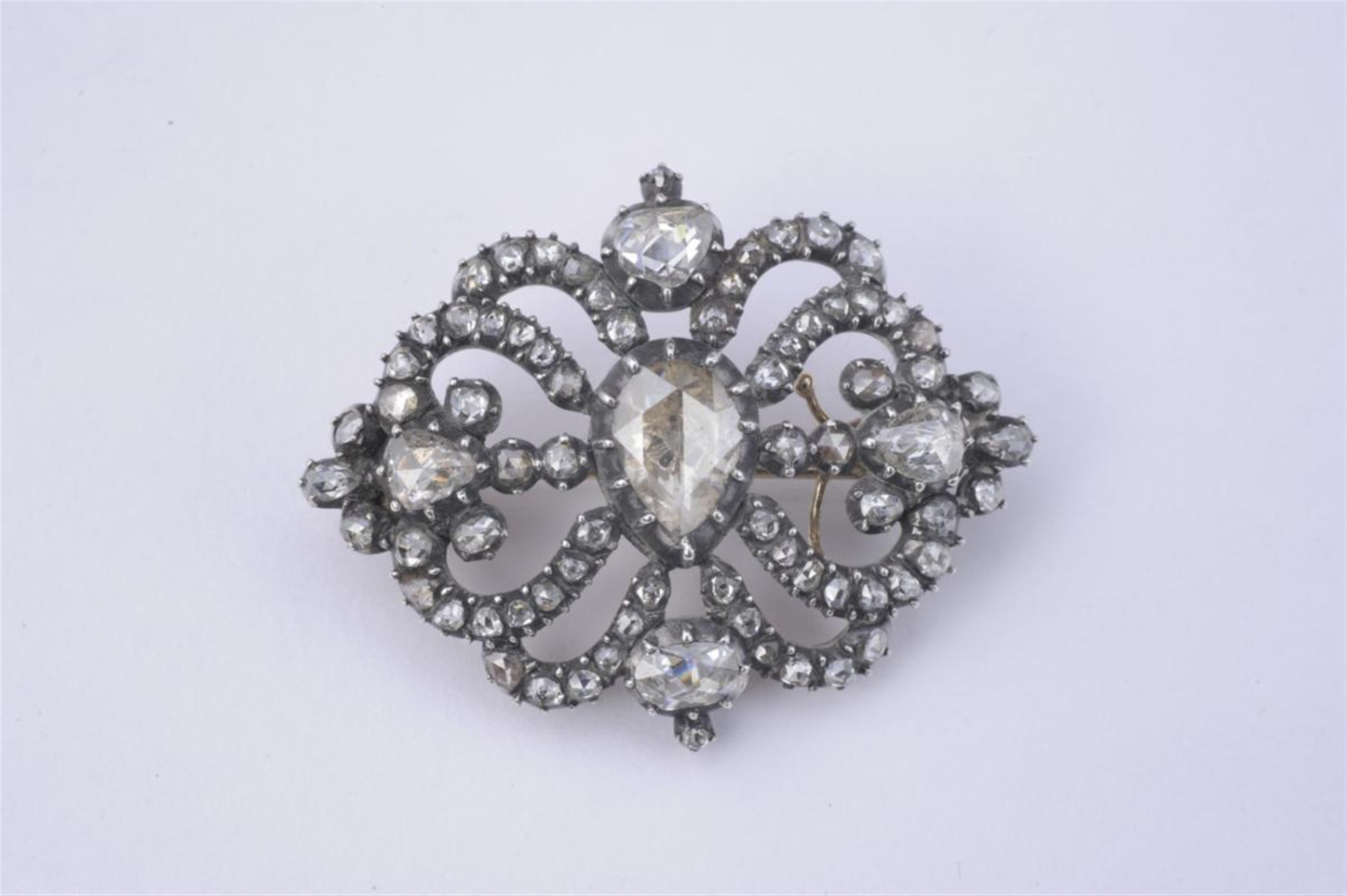 A 14k red gold, silver and diamond brooch. - image-1