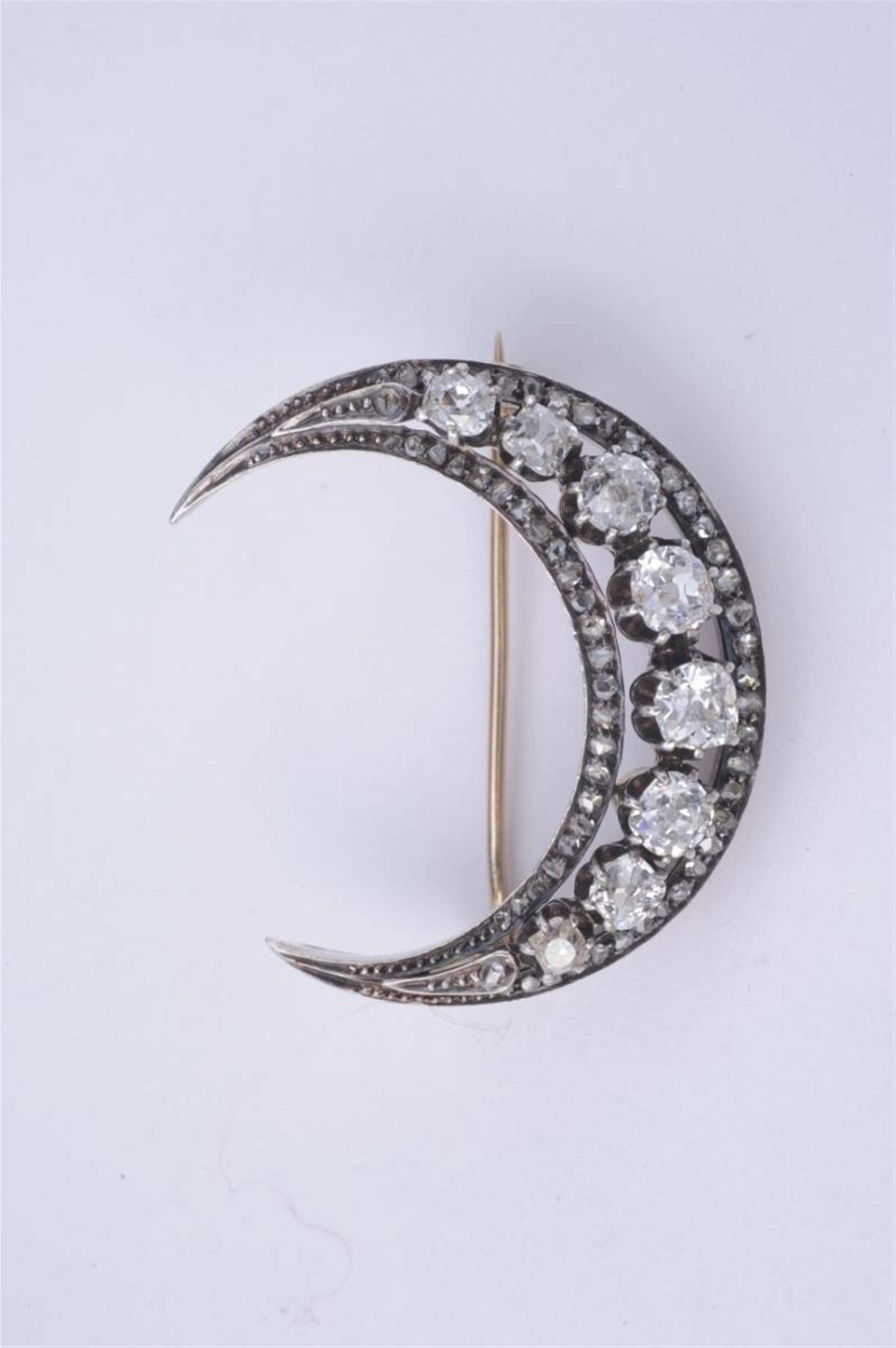 A 14k red gold and silver Belle Epoque brooch formed as a crescent moon. - image-1