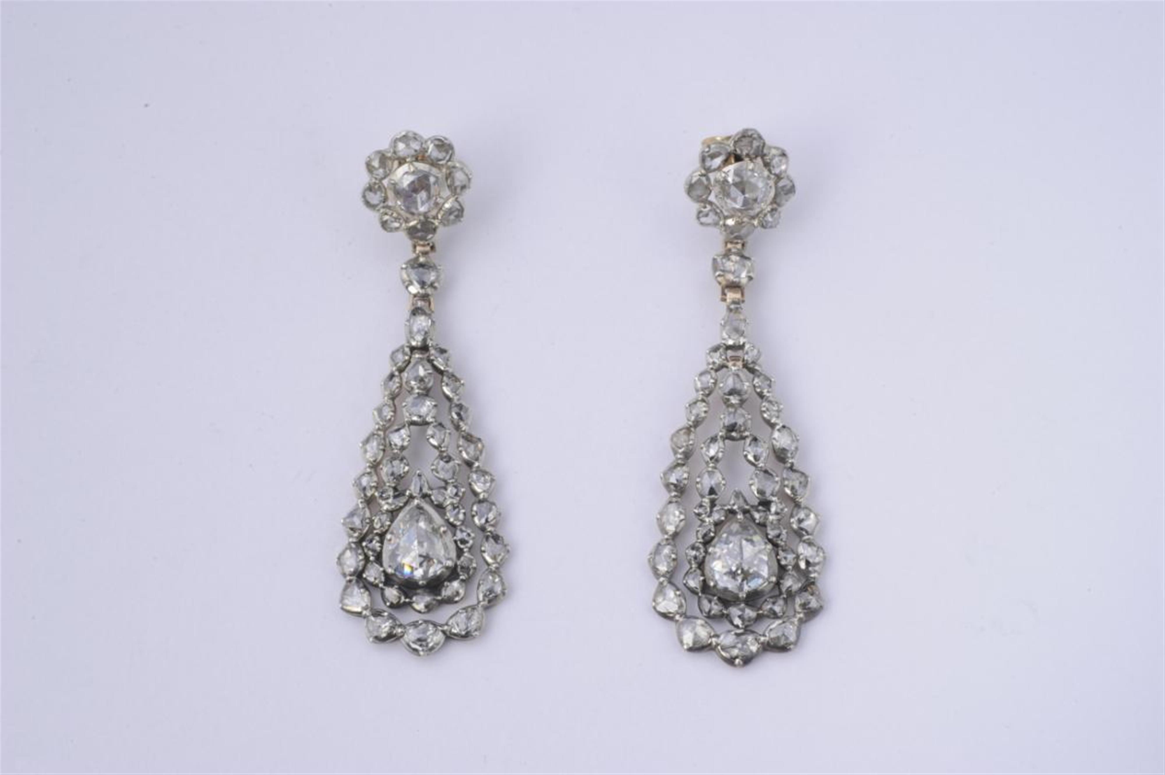 A pair of silver, red gold and diamond Pendeloque pendent earrings. - image-1