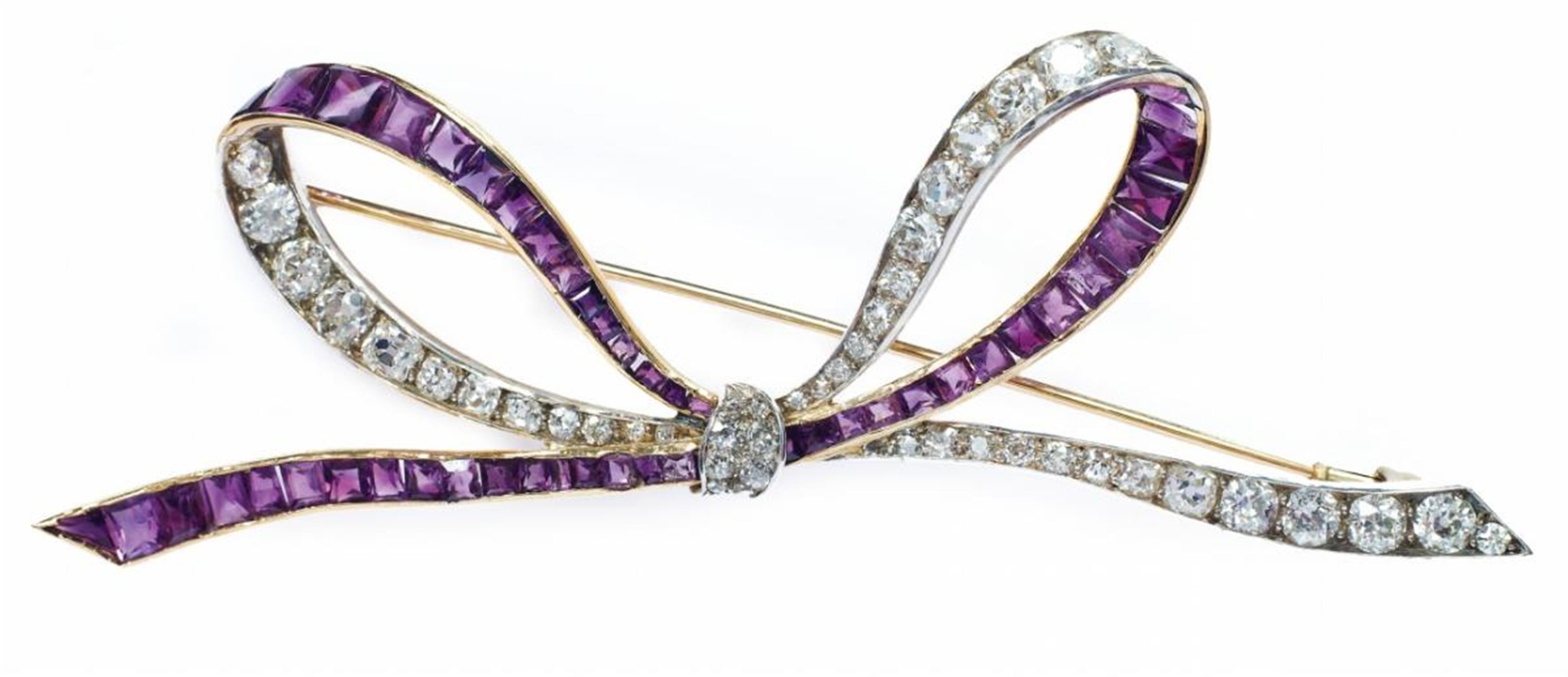 A large, 14k gold Viennese brooch formed as a bow. - image-2