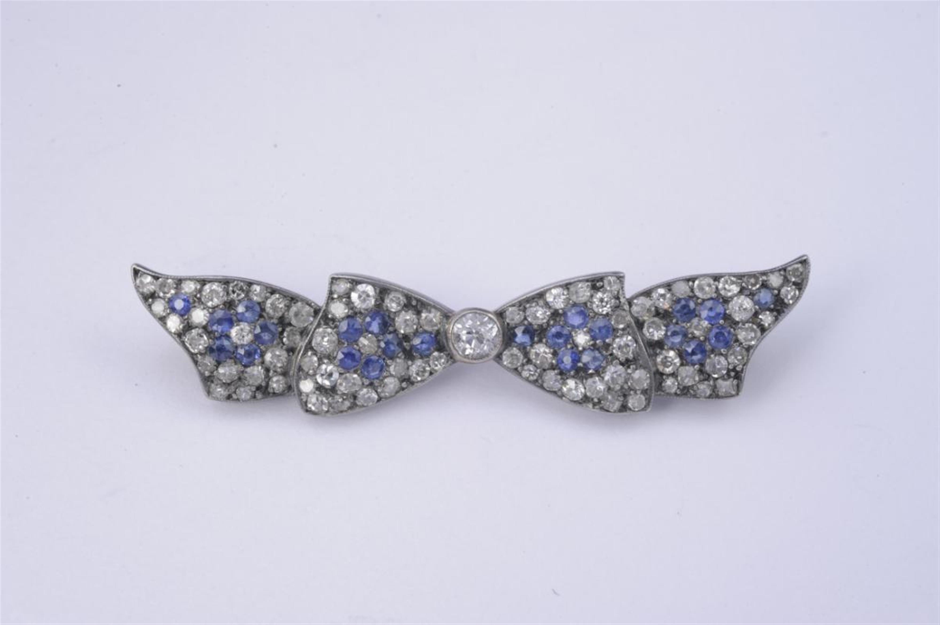 A 14k gold, sapphire and diamond Art Déco brooch - image-1