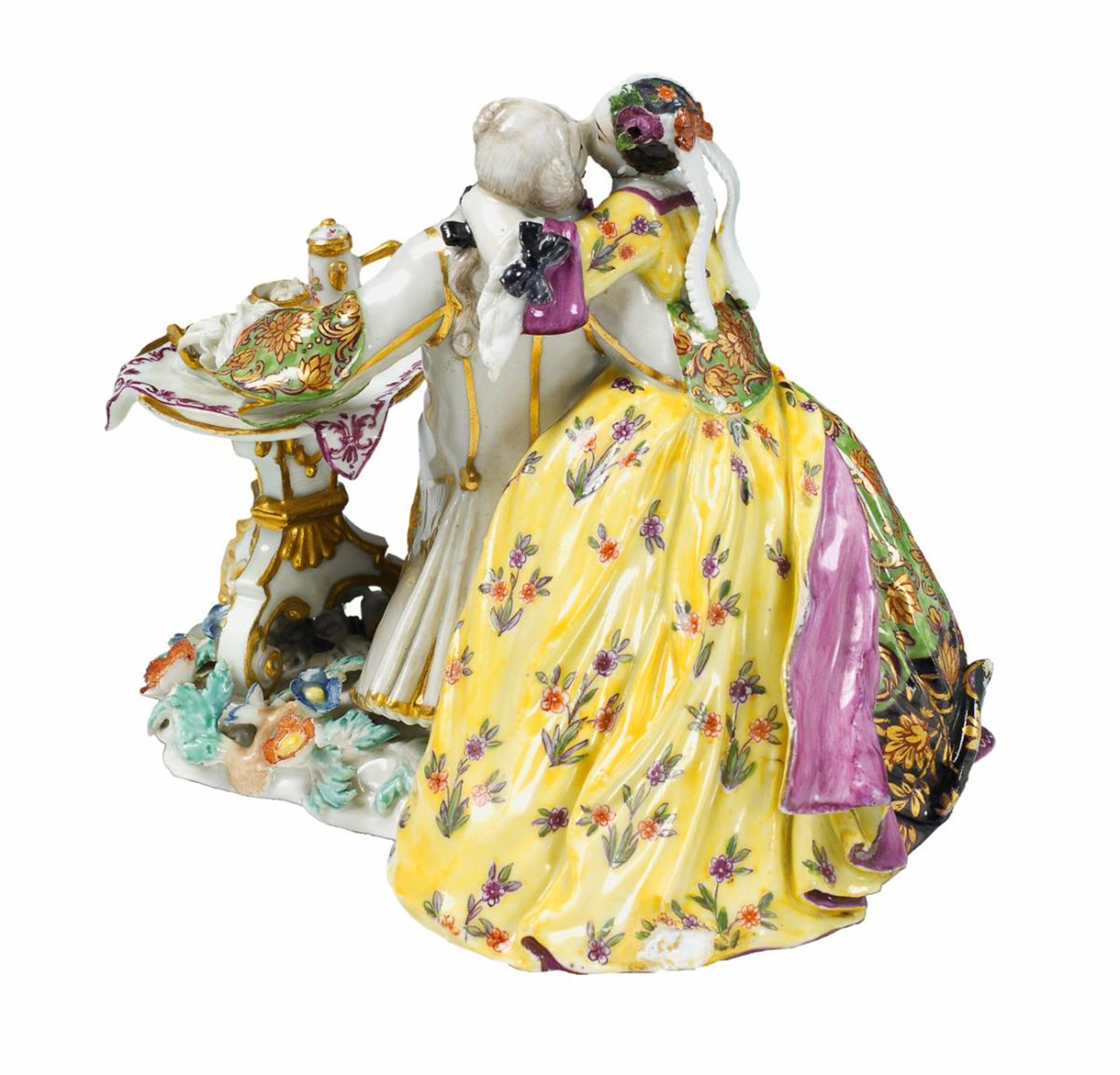 A rare Meissen group showing a finely dressed couple enjoying hot chocolate at a table on a floral base. Liebespaar bei der Schokolade - image-3