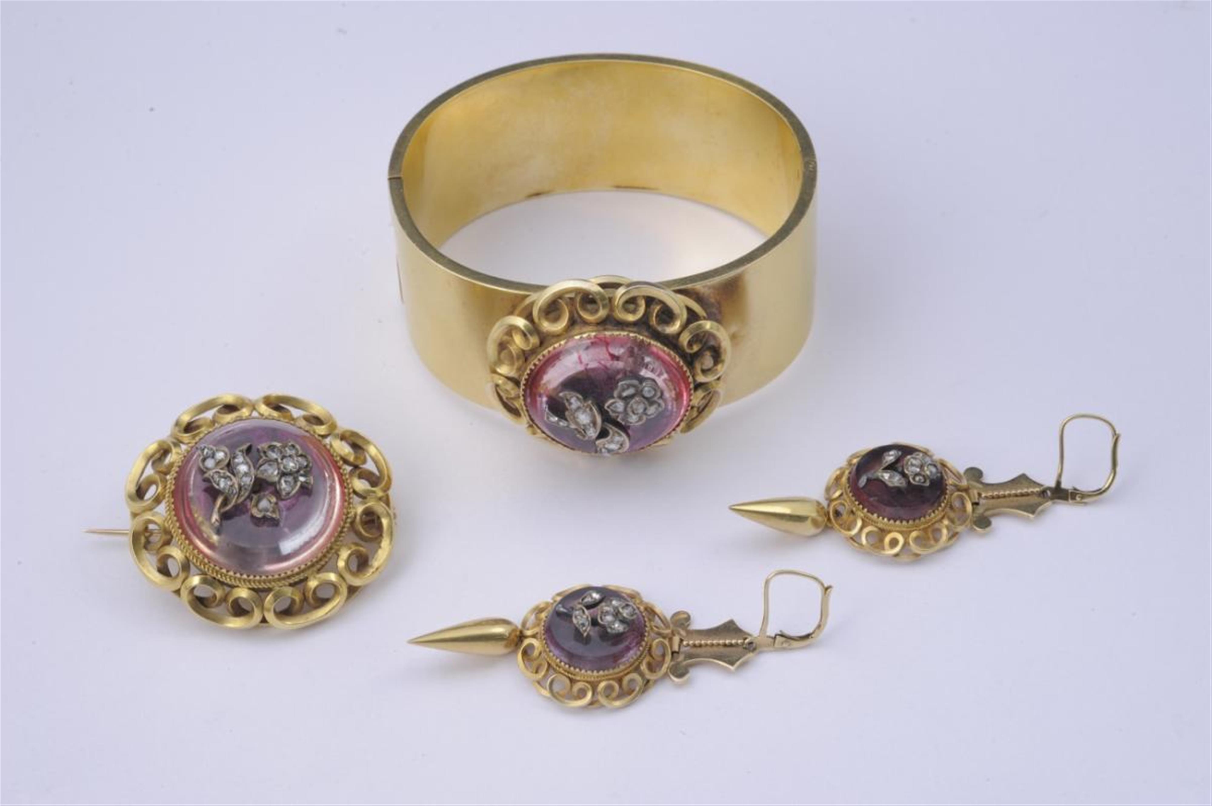 A 14k gold, silver, diamond and pink foiled quartz historicist demiparure - image-1