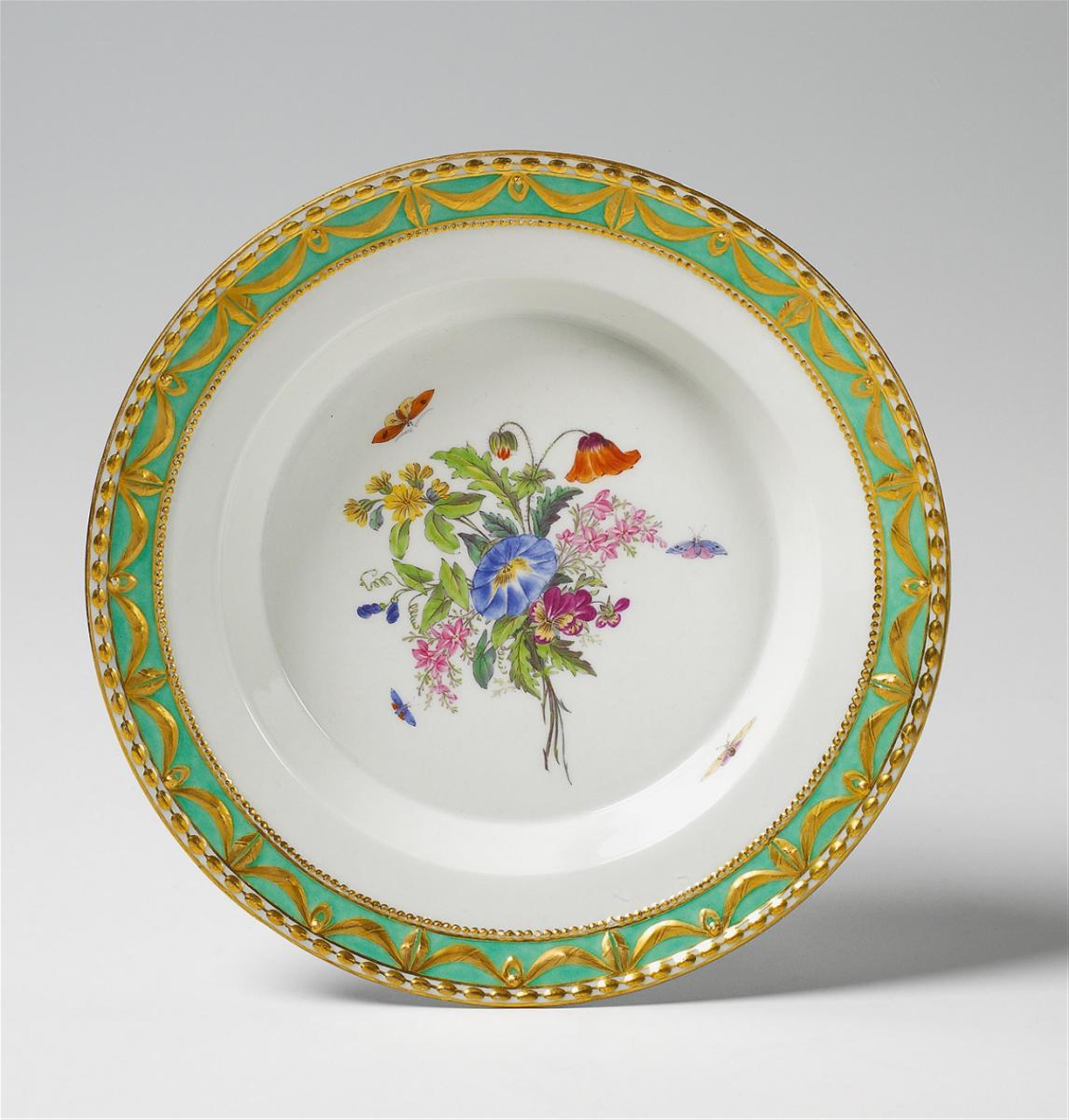 A Berlin KPM dish from a royal service with wildflower and insect decor. - image-1