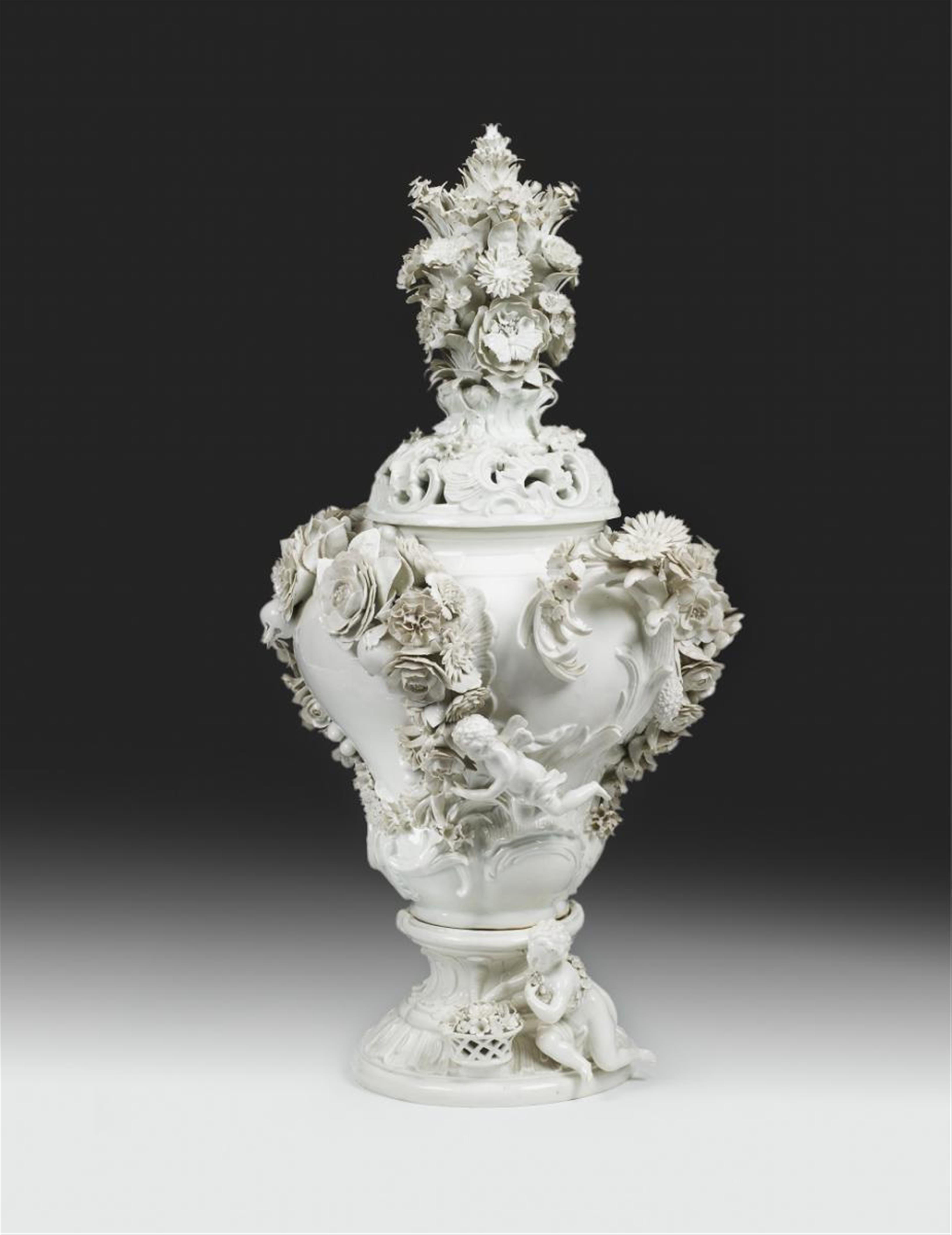 A large, opulent Meissen vase with flowers and putti after a Rococo design. - image-1