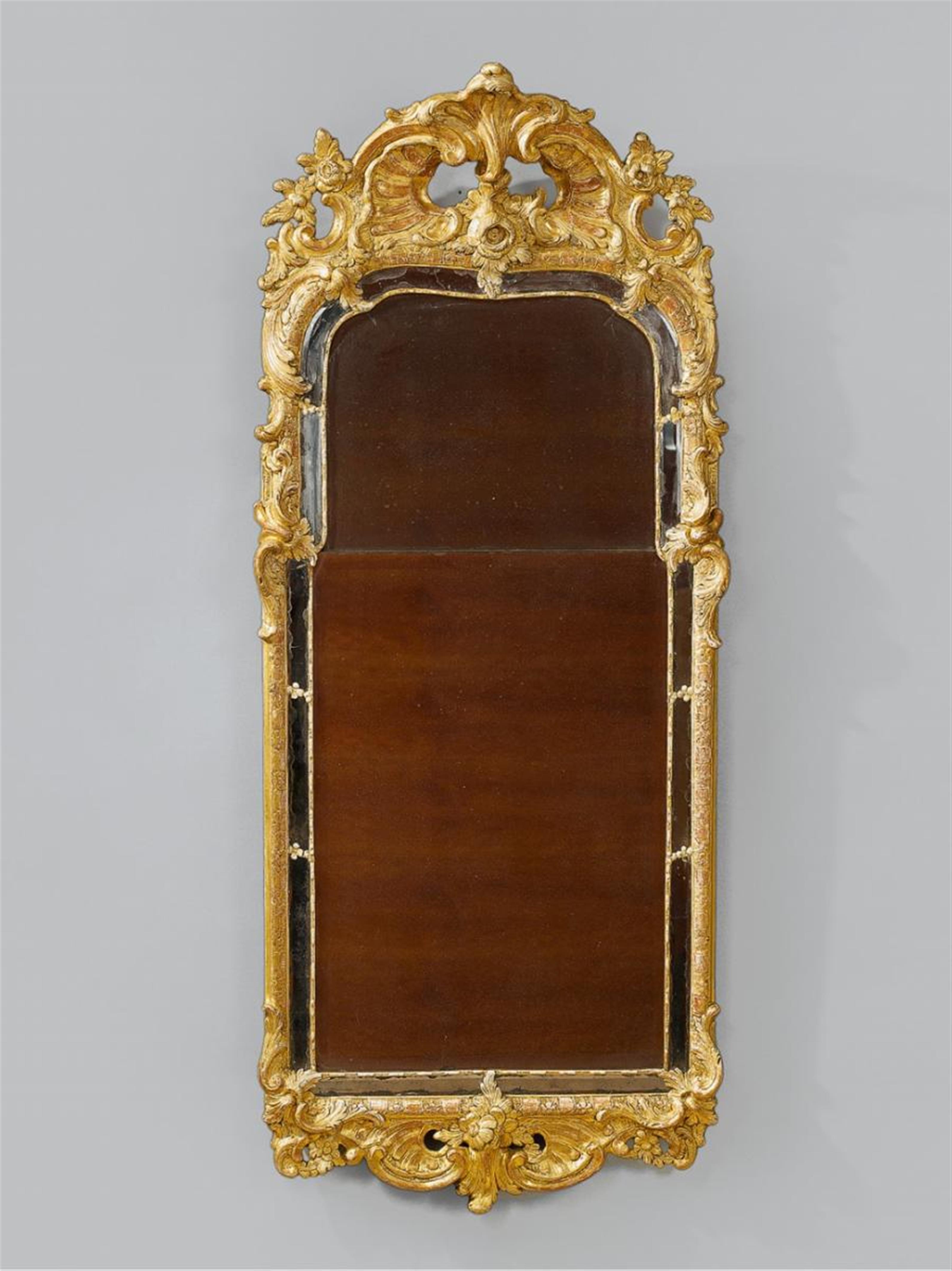 A gilt softwood époque Louis XV mirror. - image-1