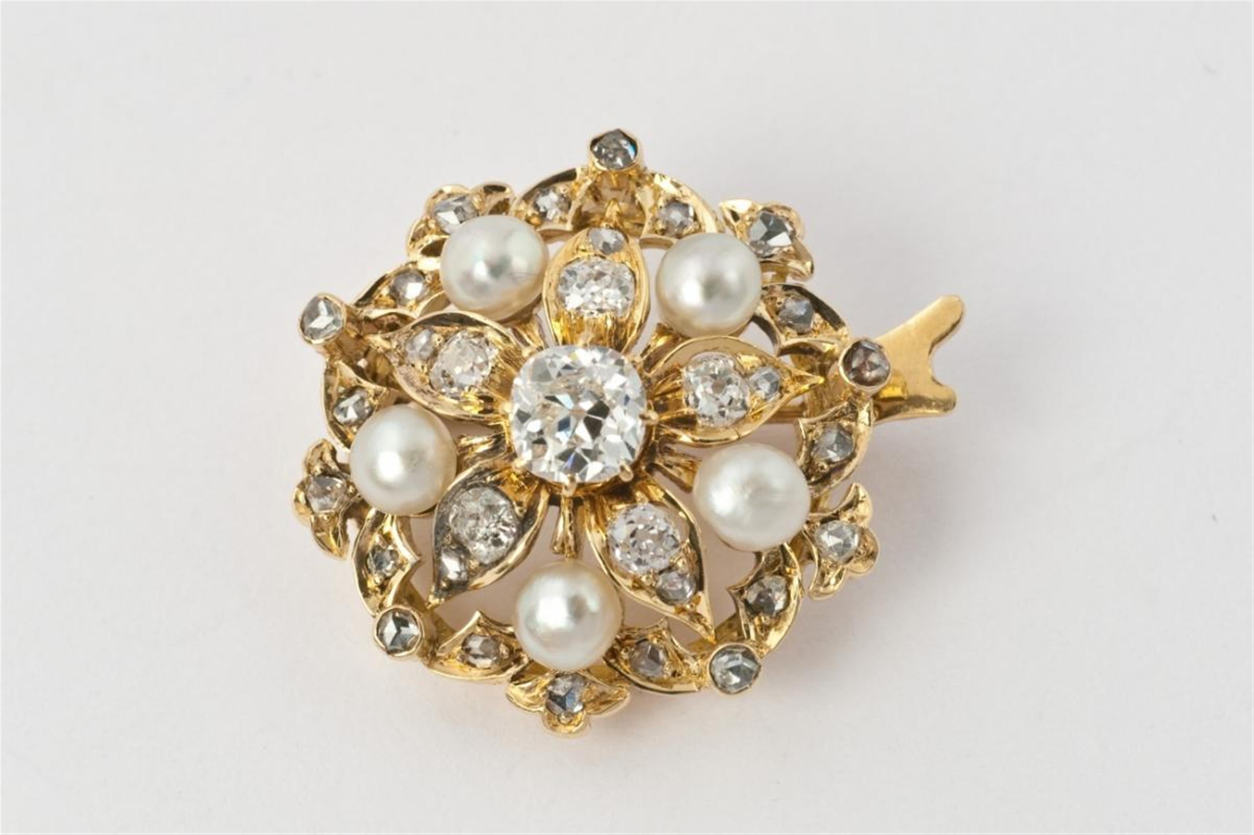 A 14k gold, diamond and pearl brooch. - image-1