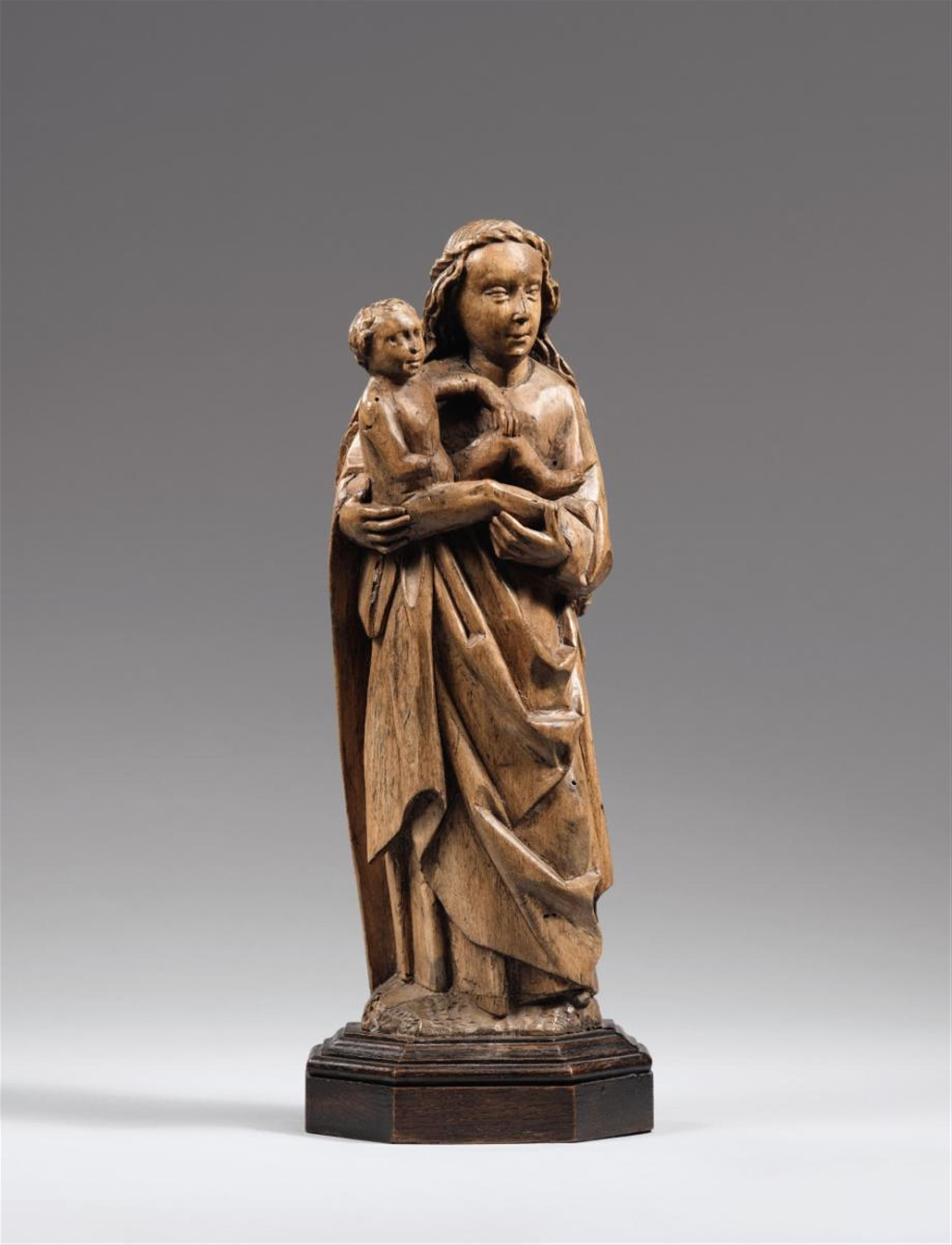 Lower Rhine Region early 16th century - An early 16th century Lower Rhenish carved wooden figure of the Virgin with Child. - image-1