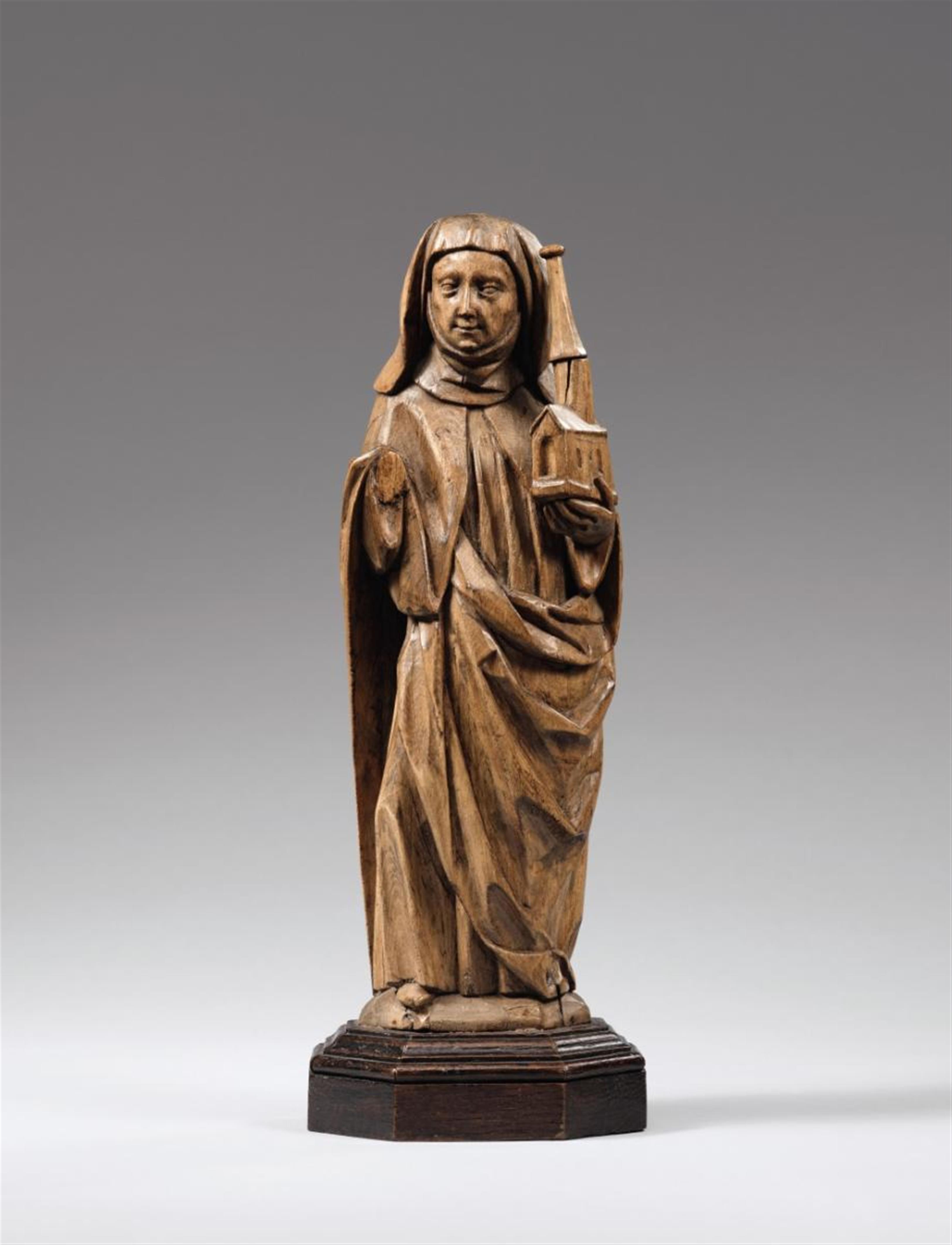 Lower Rhine Region early 16th century - An early 16th century Lower Rhenish carved wooden figure of Saint Clara. - image-1