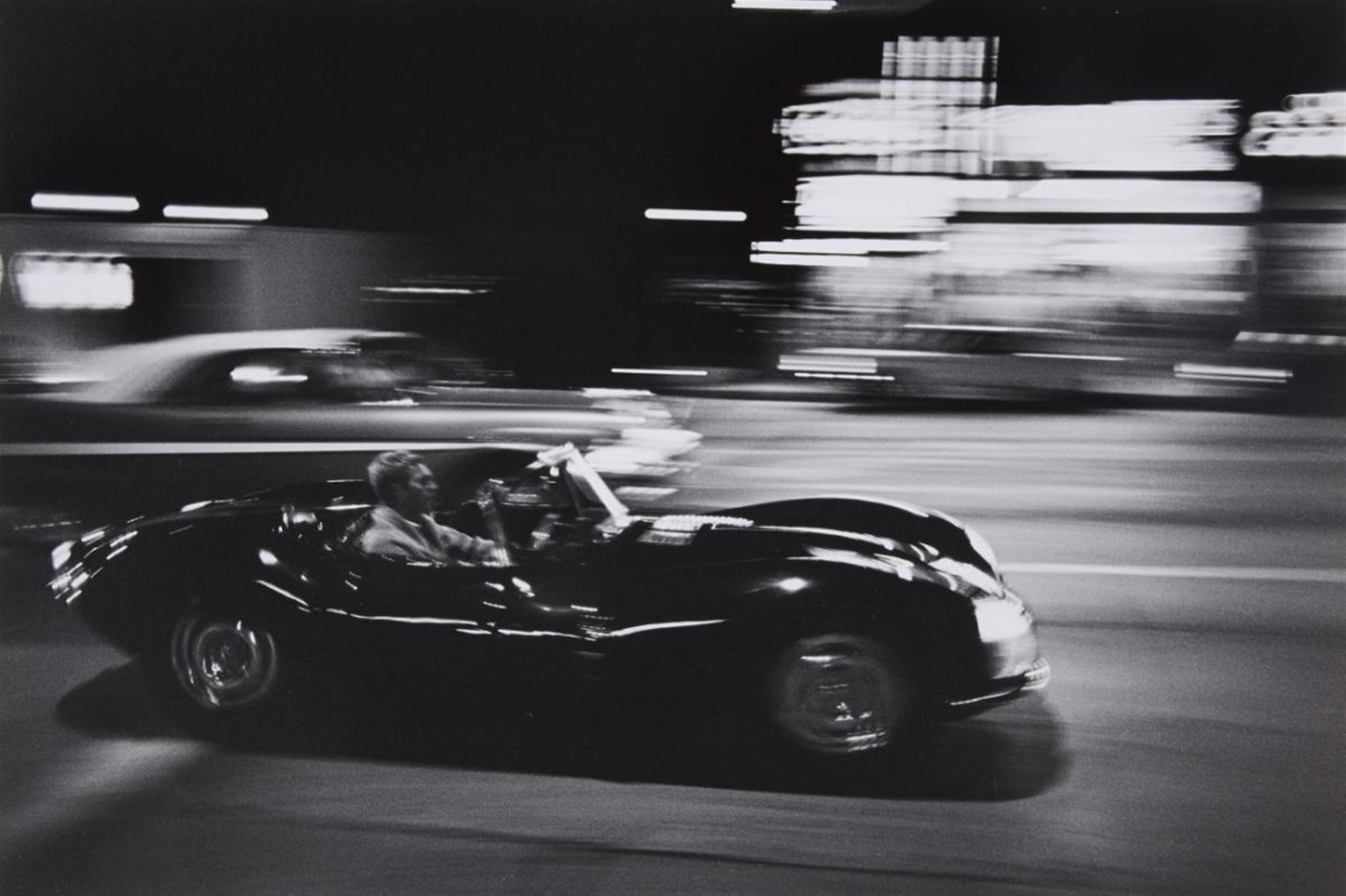 John Dominis - Steve McQueen driving his Jaguar at night, California - image-1