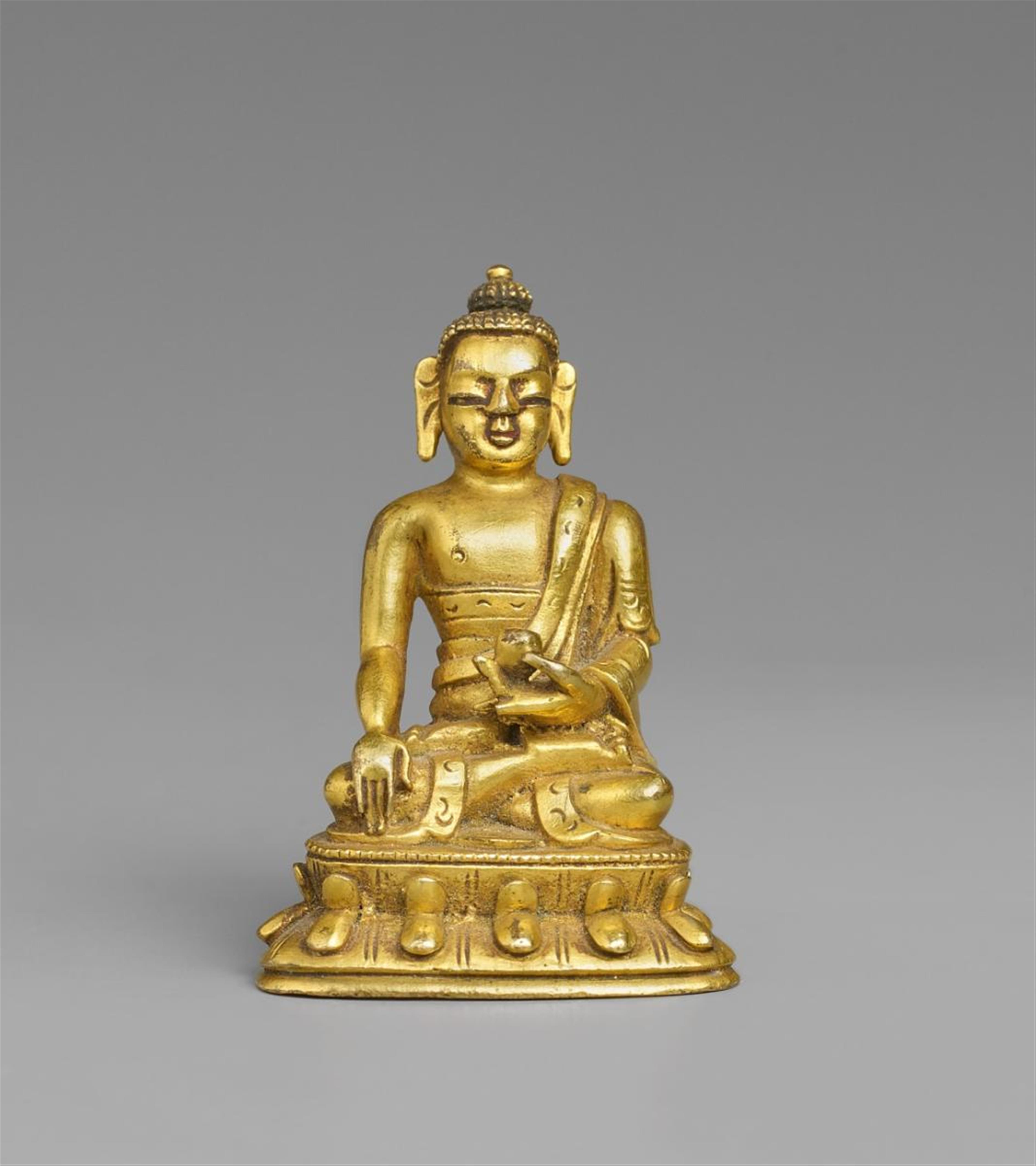 A miniature gilt bronze figure of Buddha Shakyamuni. Sinotibetan - image-1