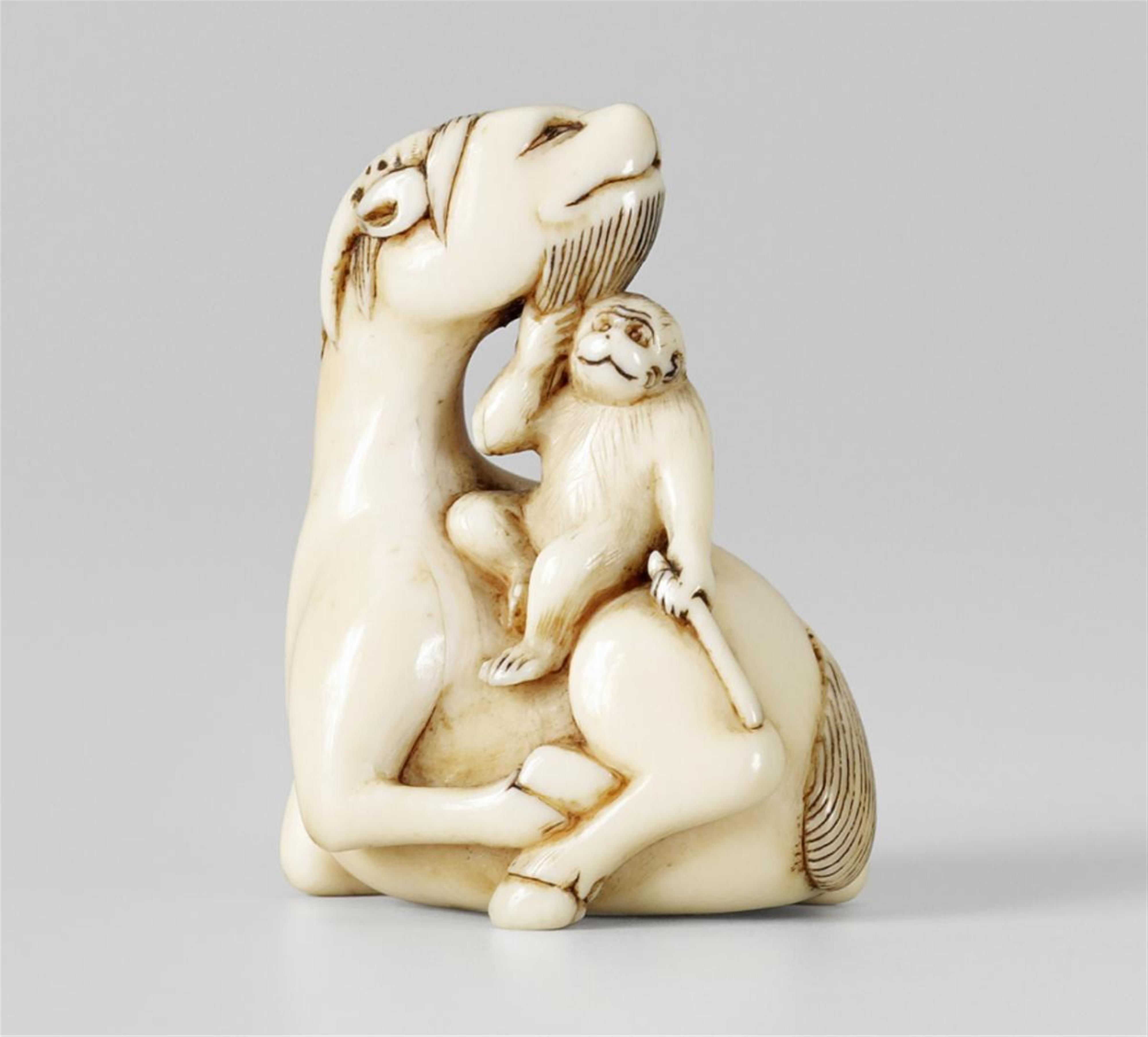 An ivory netsuke of a small monkey sitting on a goat. Late 18th/early 19th century - image-1