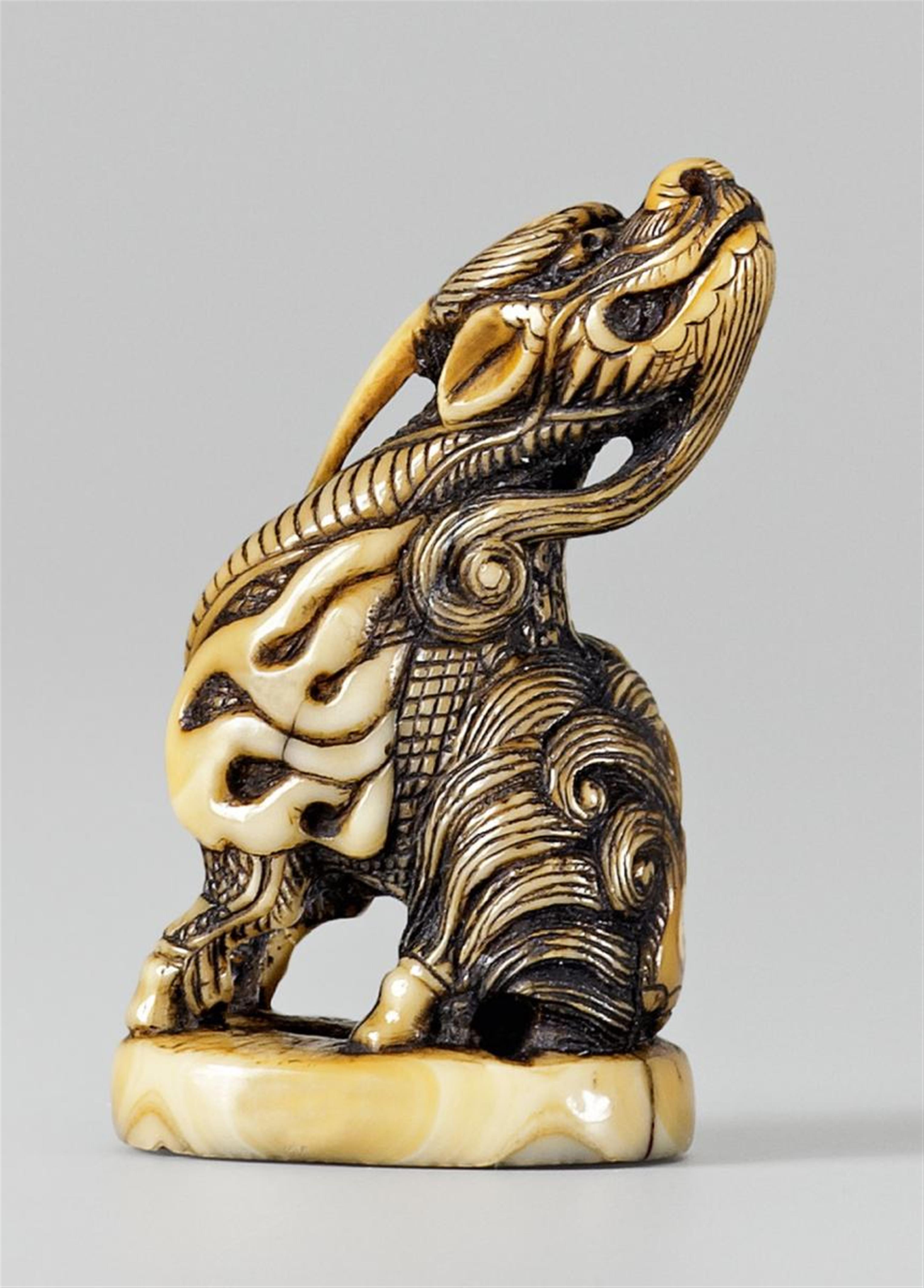 A good possibly marine ivory seal netsuke of a suisai. Late 18th century - image-1