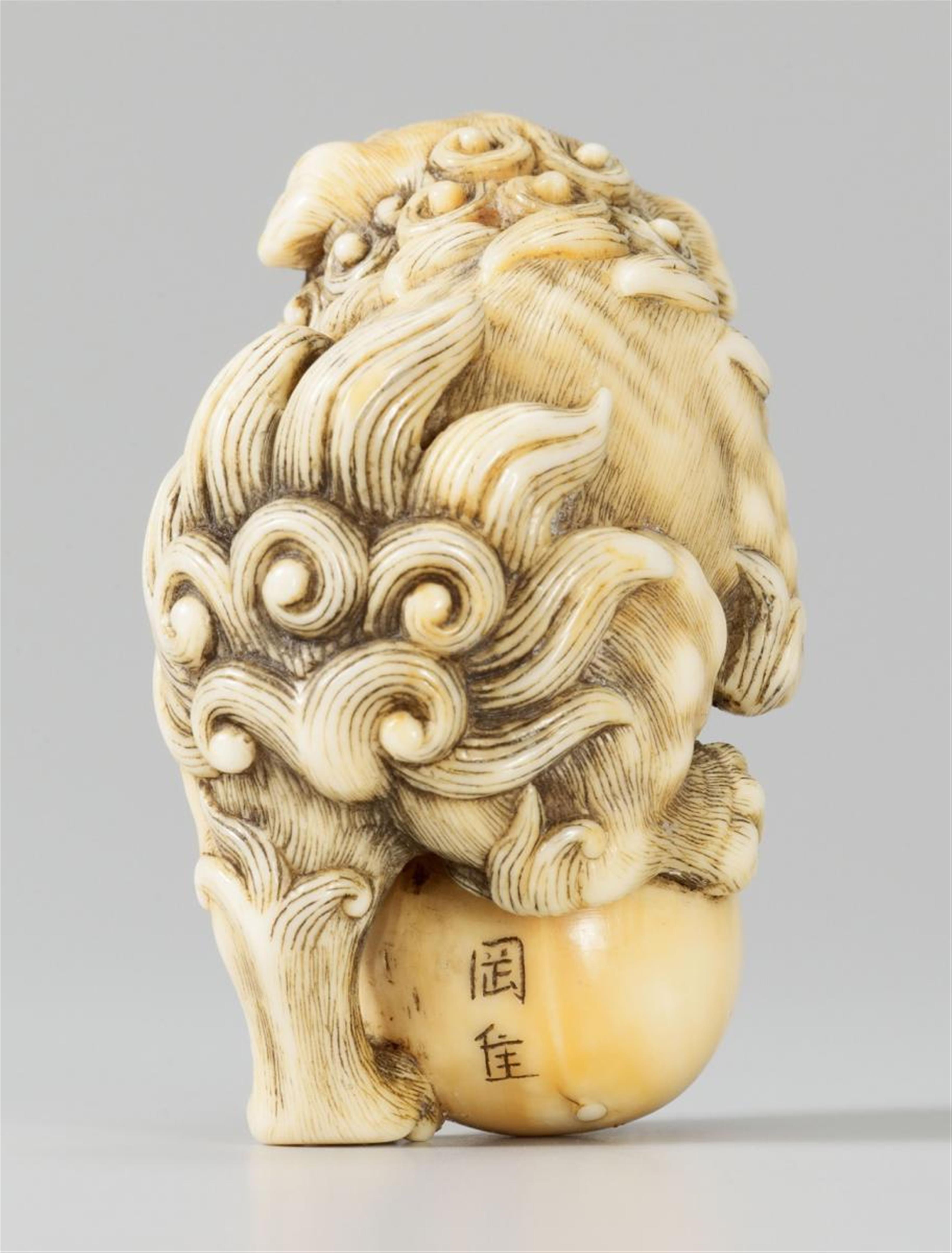 A very good Kyoto school ivory netsuke of a lively shishi climbing on a ball, by Okatori. Late 18th/early 19th century - image-2