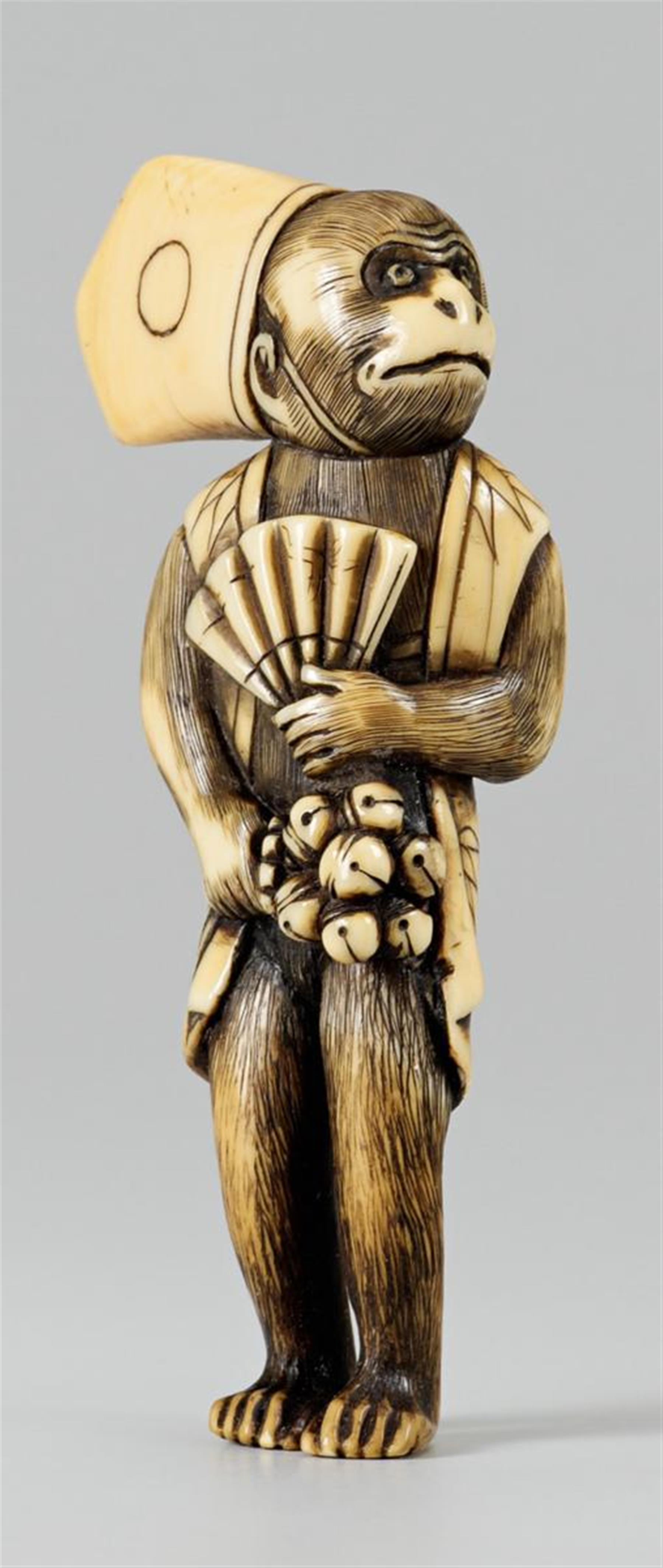 An ivory netsuke of a monkey as sanbasô. 19th century - image-1