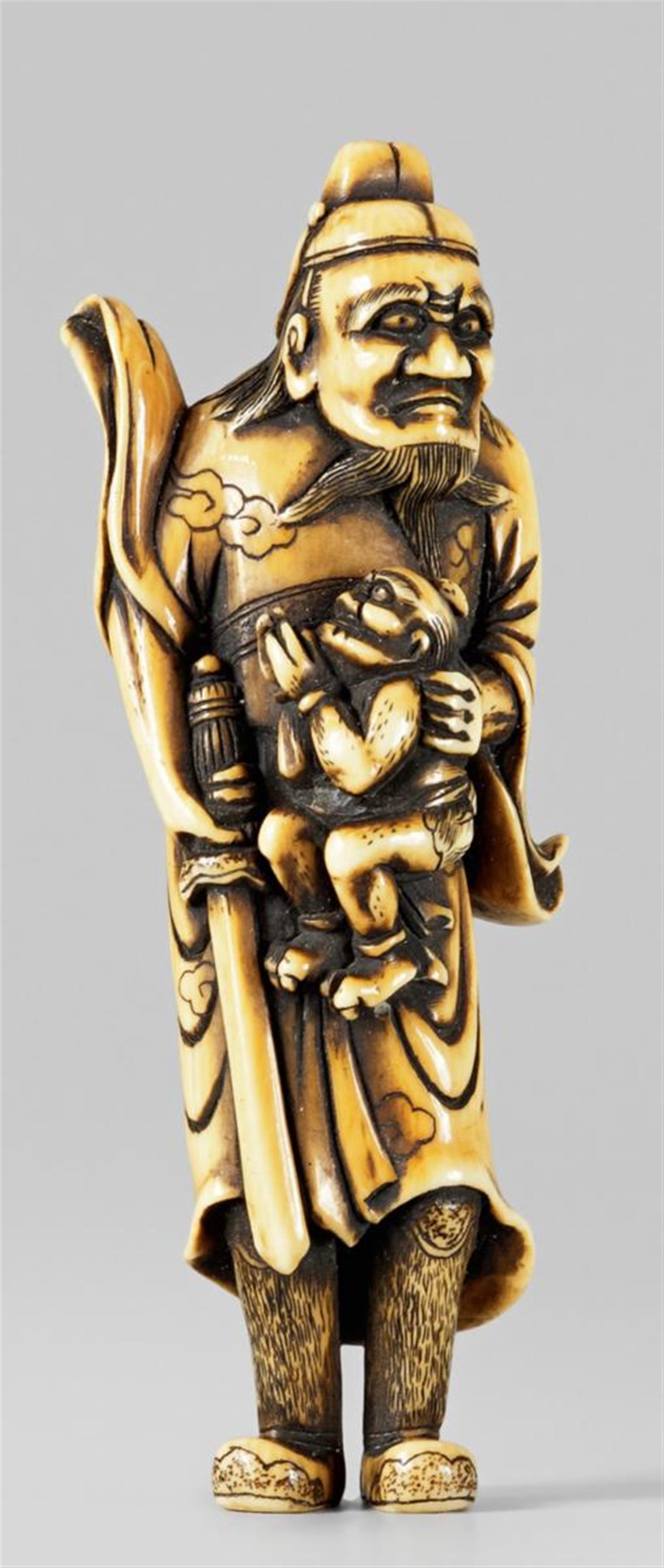 A stained ivory netsuke of a fierce looking Shôki with an oni. 19th century - image-1