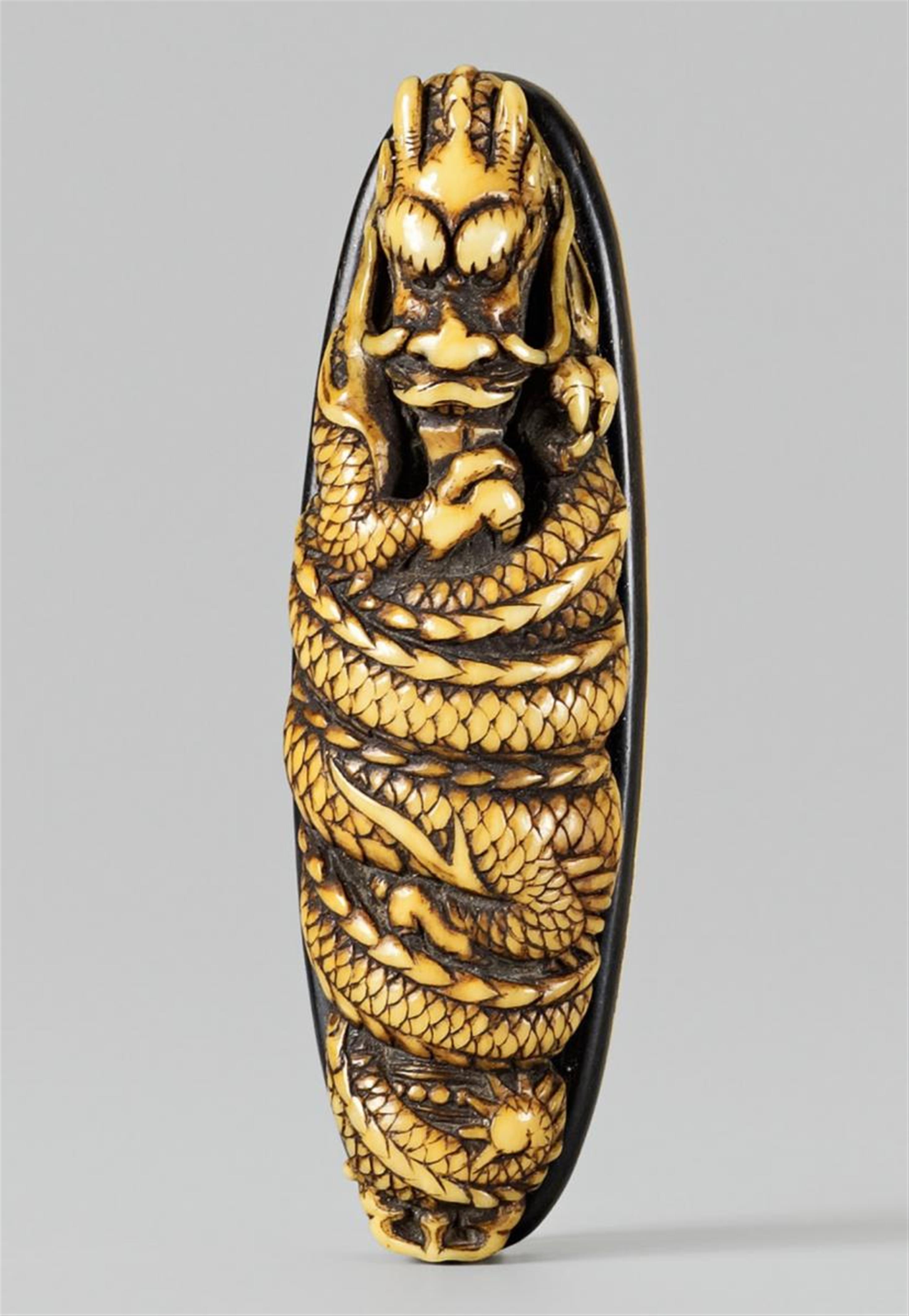 An ivory netsuke of an amakurikara dragon. 19th century - image-1