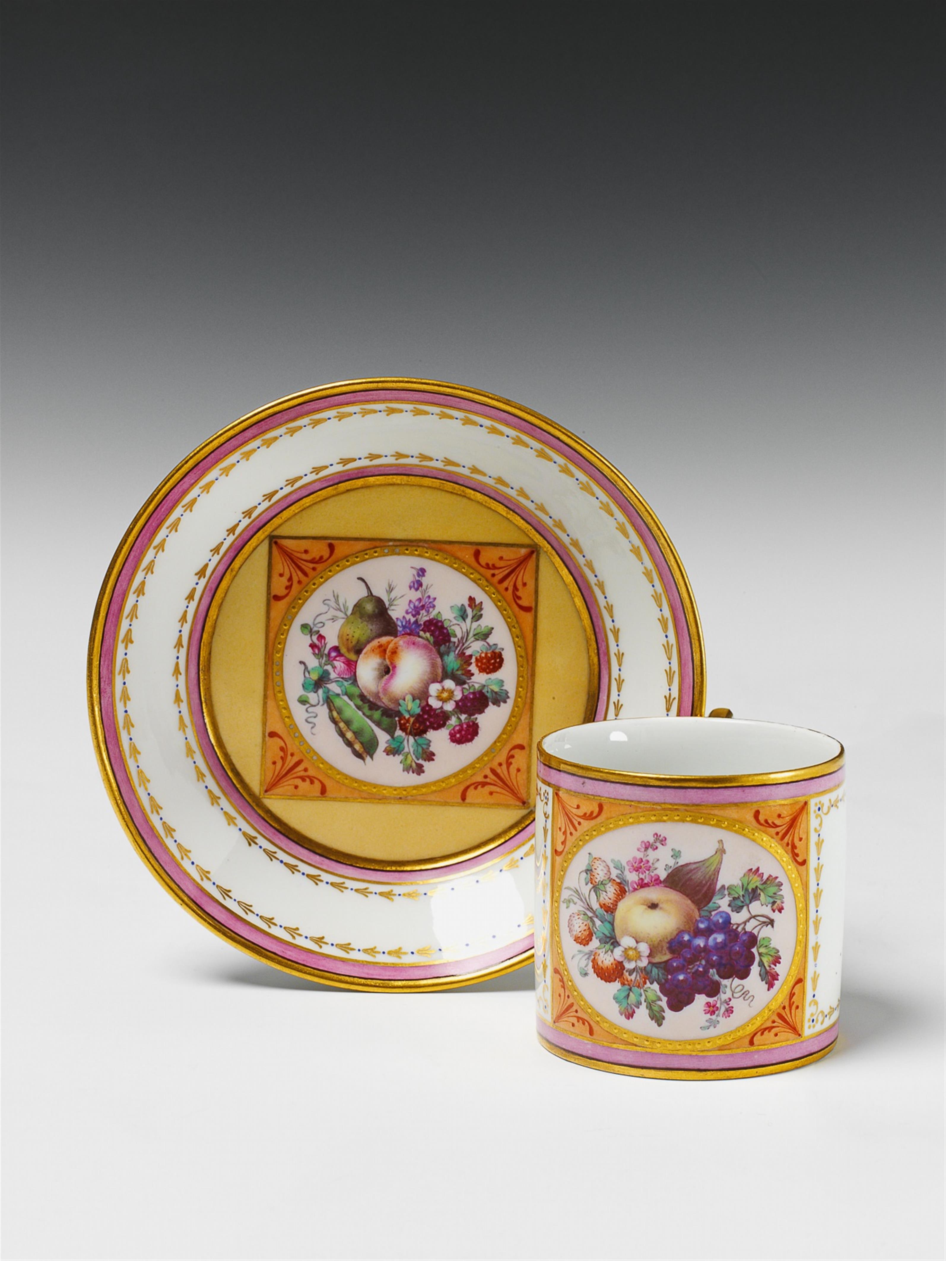 A Berlin KPM porcelain cup and saucer with finely painted fruit decor. - image-1