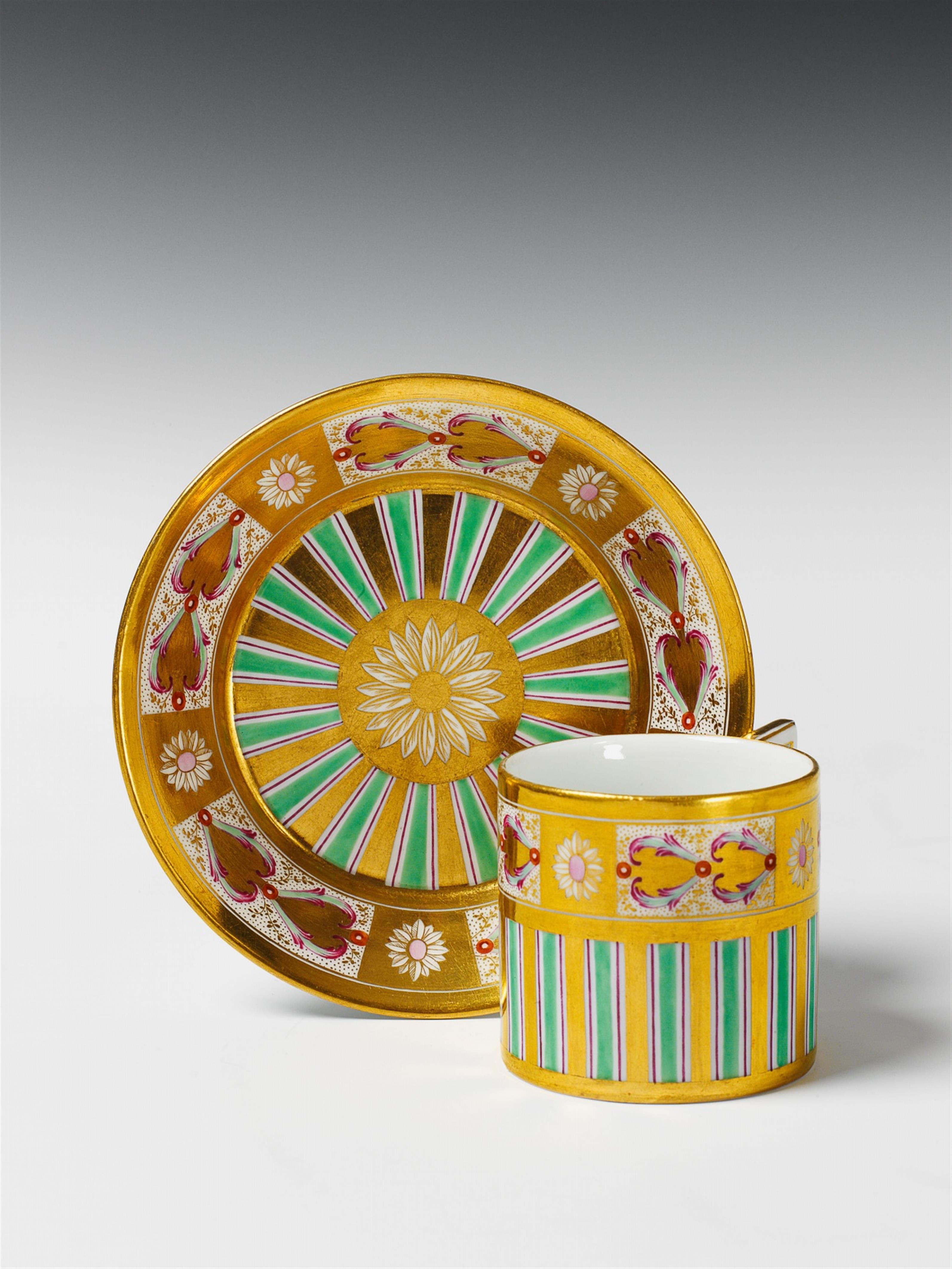 A Berlin KPM porcelain cup with gilding and red and green striped decor. - image-1