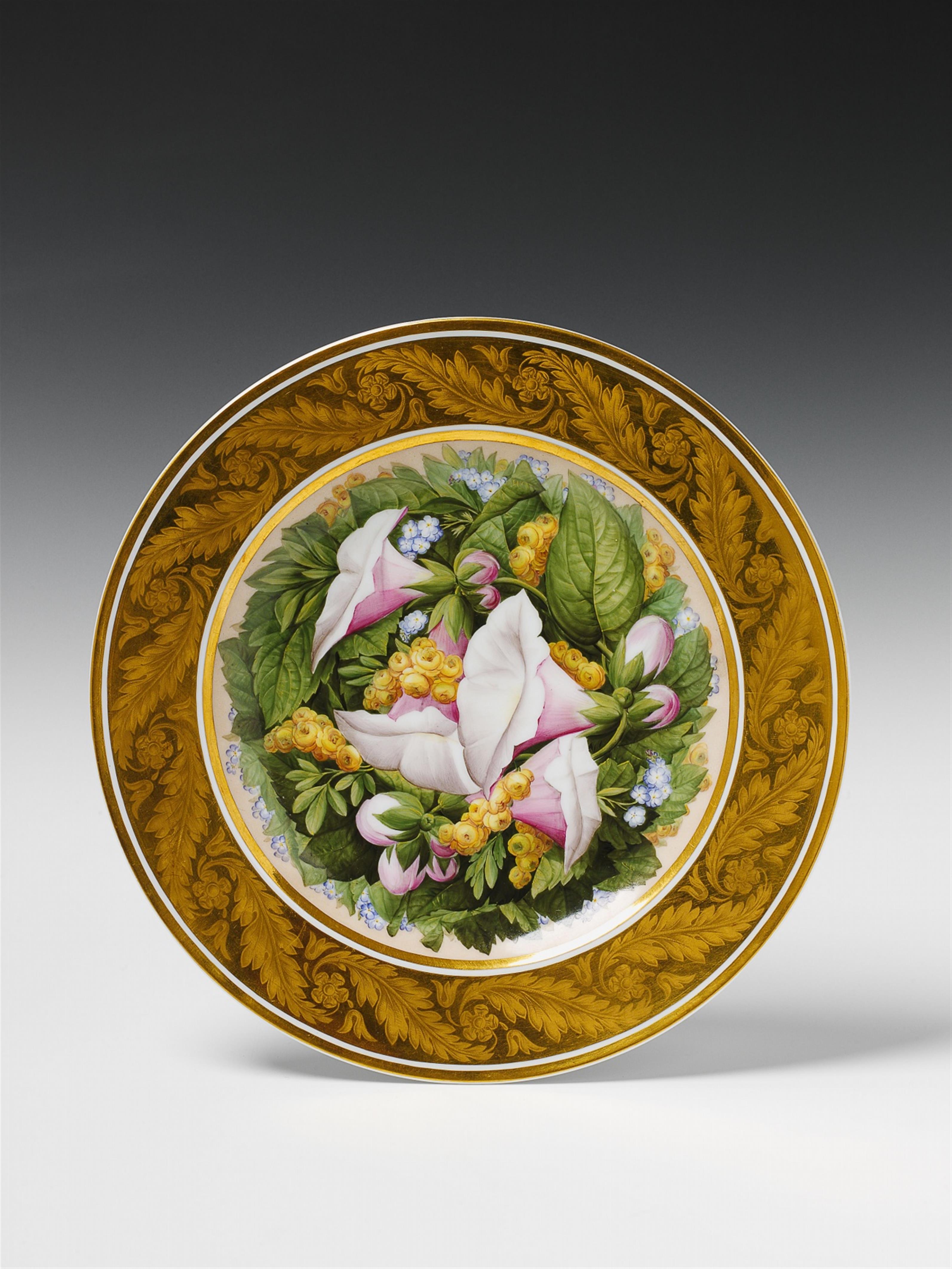 A Berlin KPM porcelain plate with floral and gilt etched foliate decor. - image-1