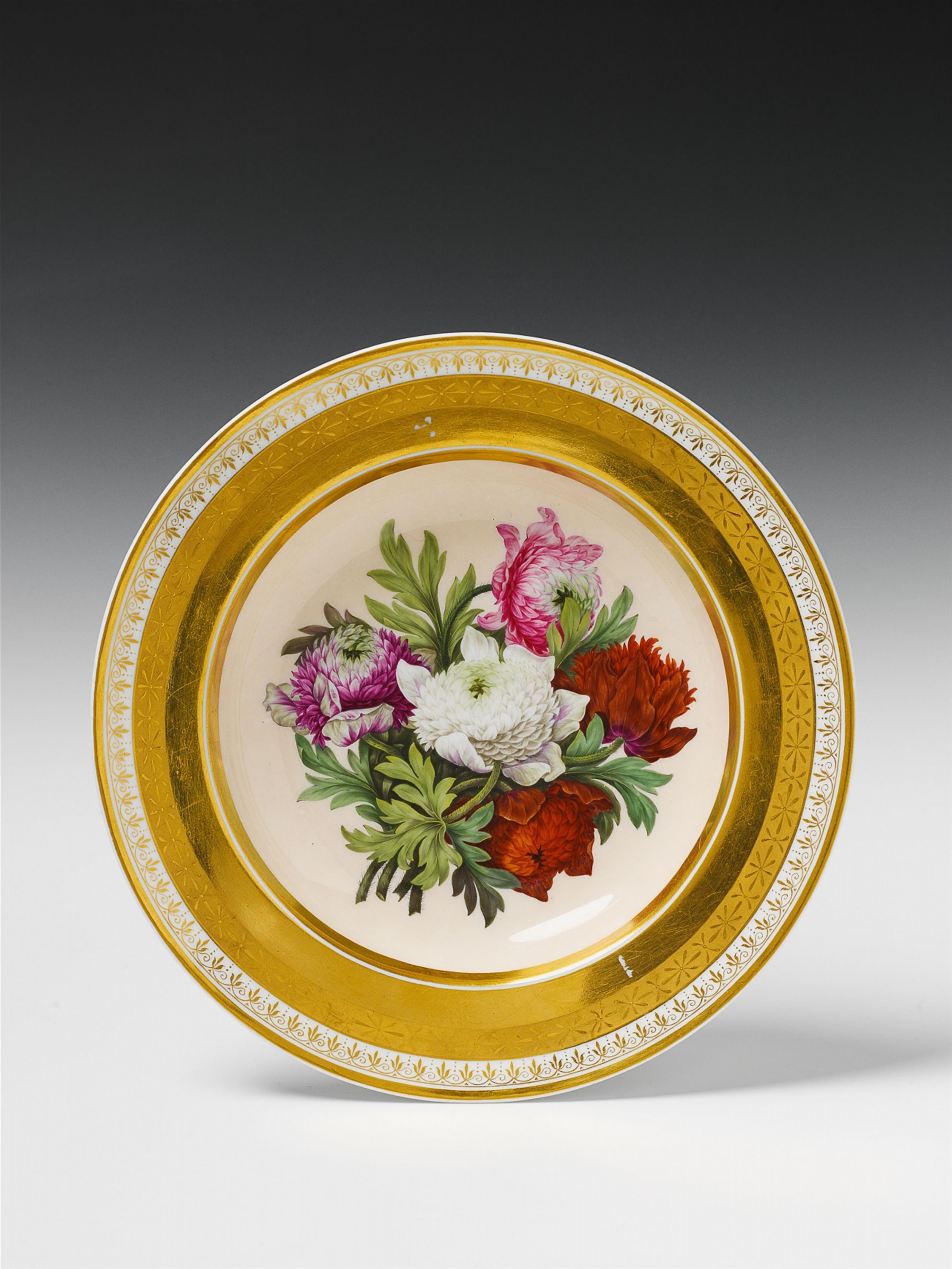 A Berlin KPM porcelain plate with dahlia flower decor. - image-1