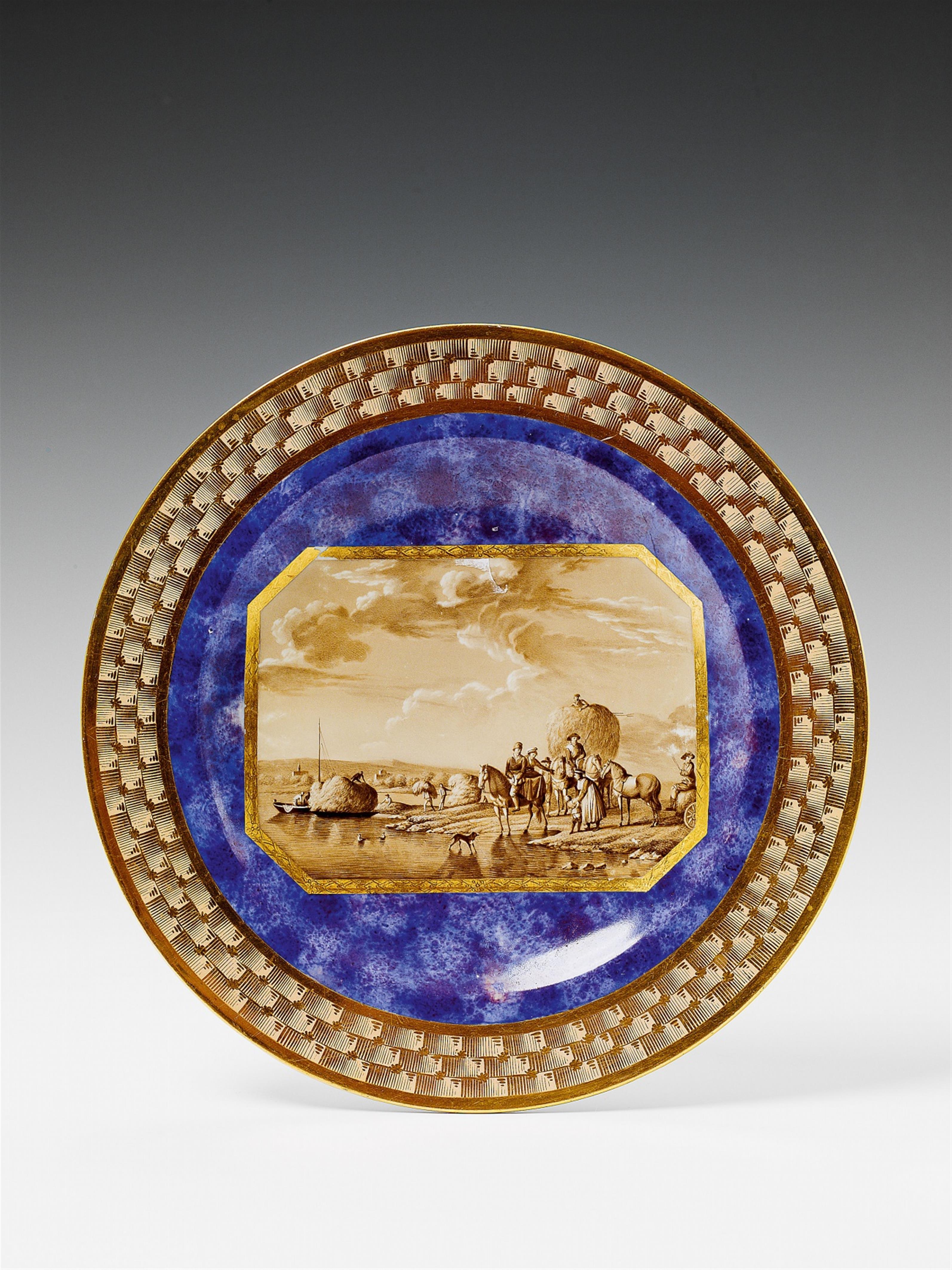 A Berlin KPM porcelain plate with a harvest scene. - image-1