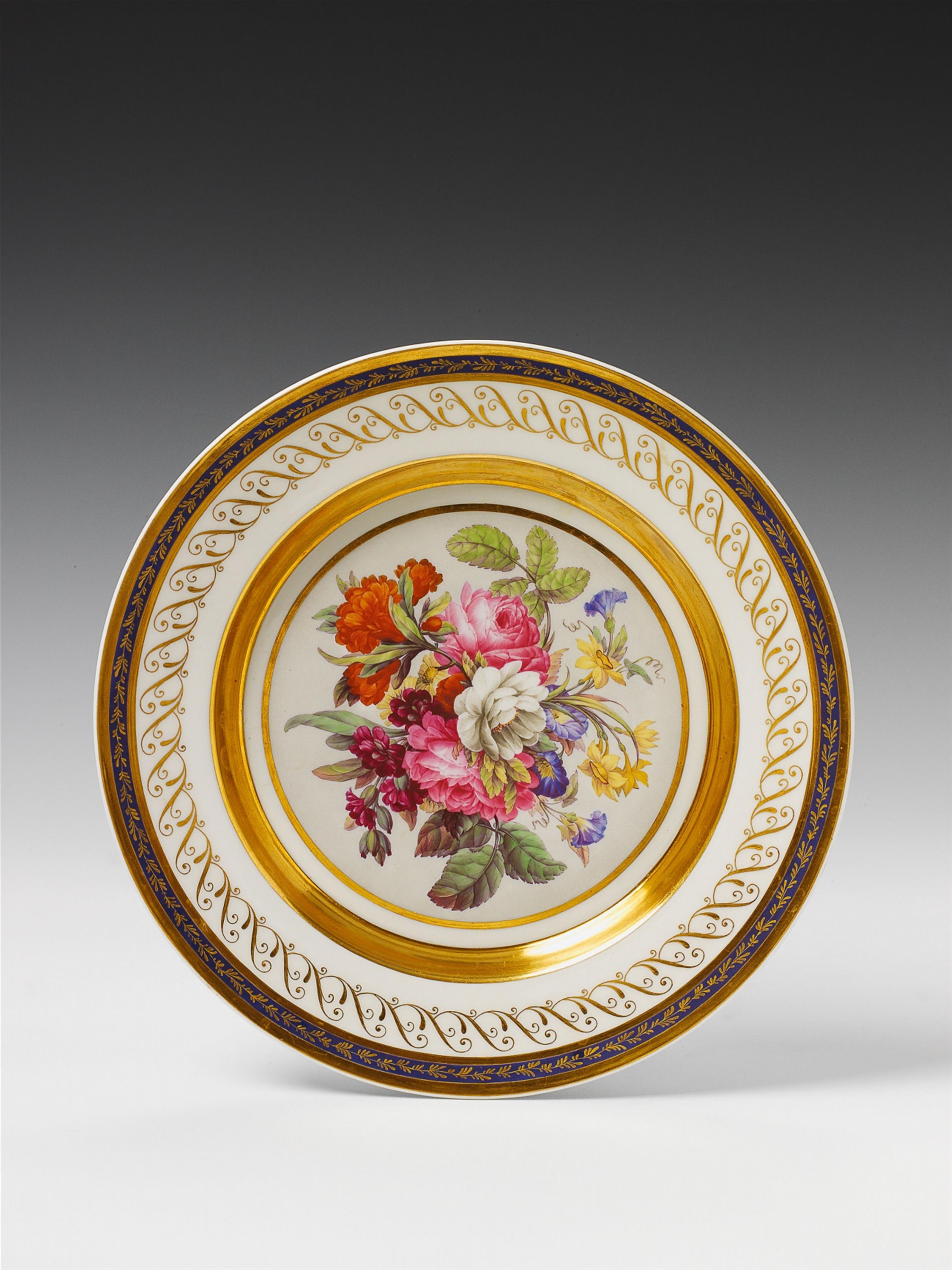 A Berlin KPM porcelain plate with floral bouquet decor. - image-1