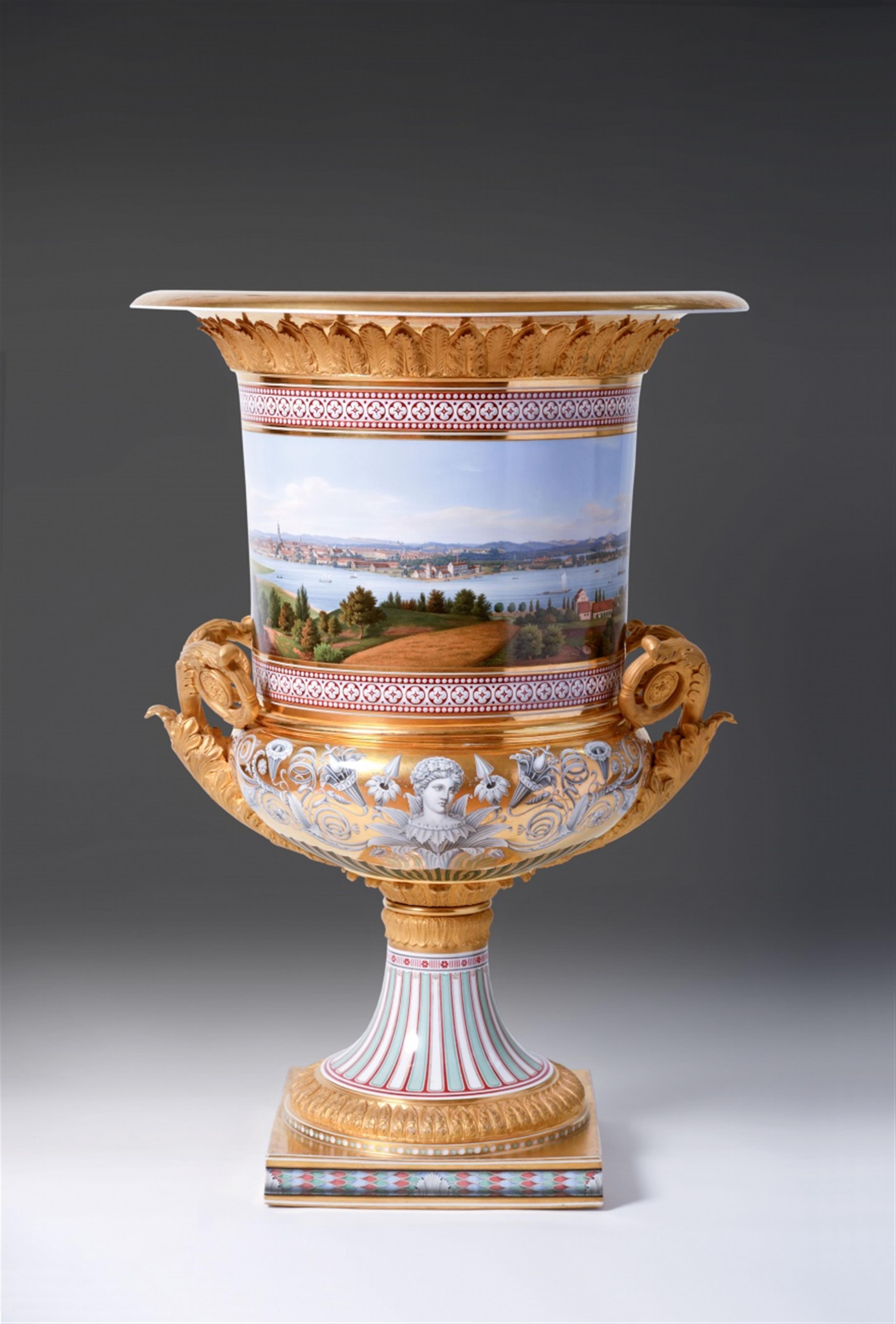 A monumental Berlin KPM ormolu-mounted porcelain krater form vase with a view of Potsdam. - image-1