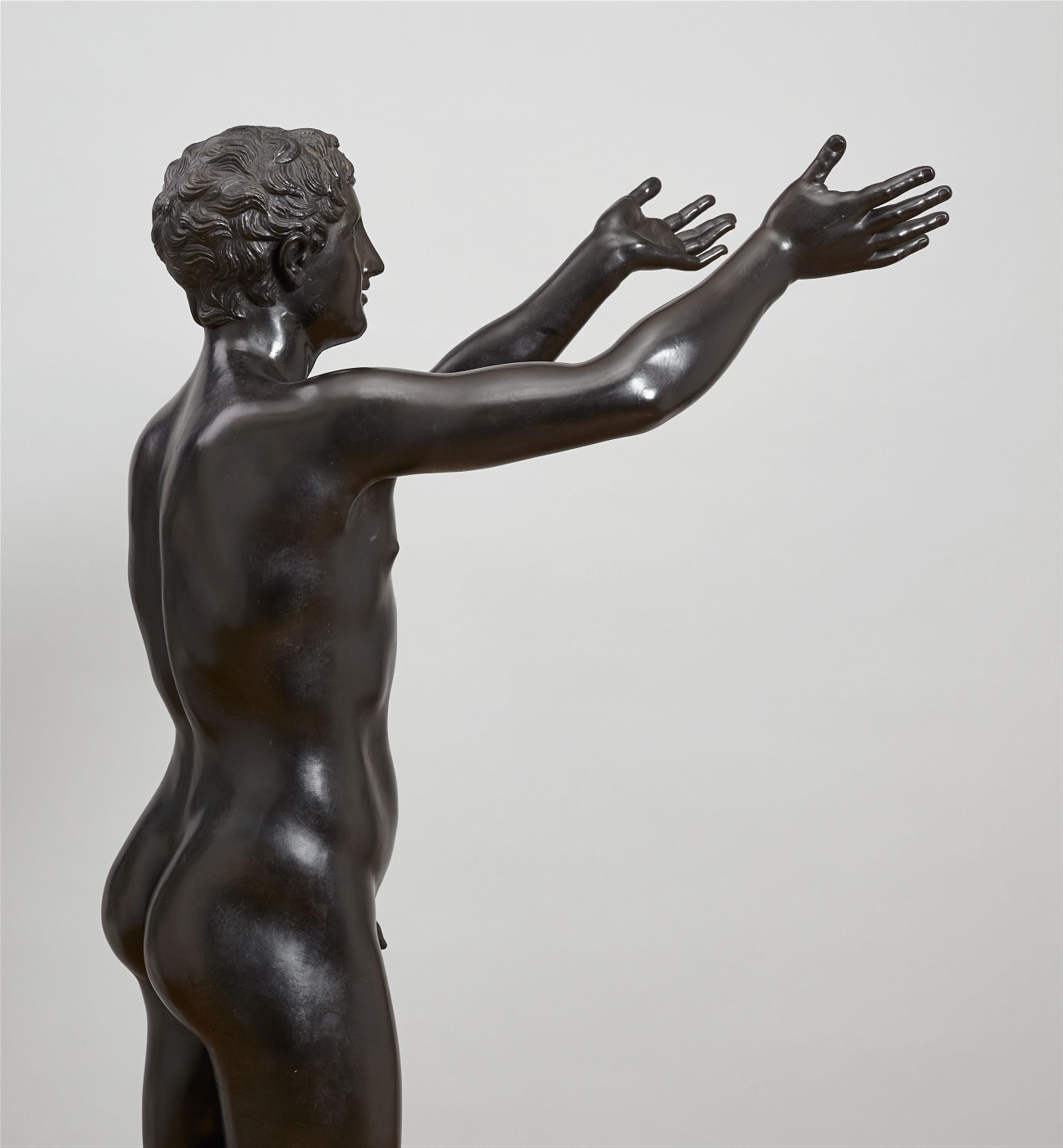 A black patinated galvinated metal figure of the praying boy. - image-2