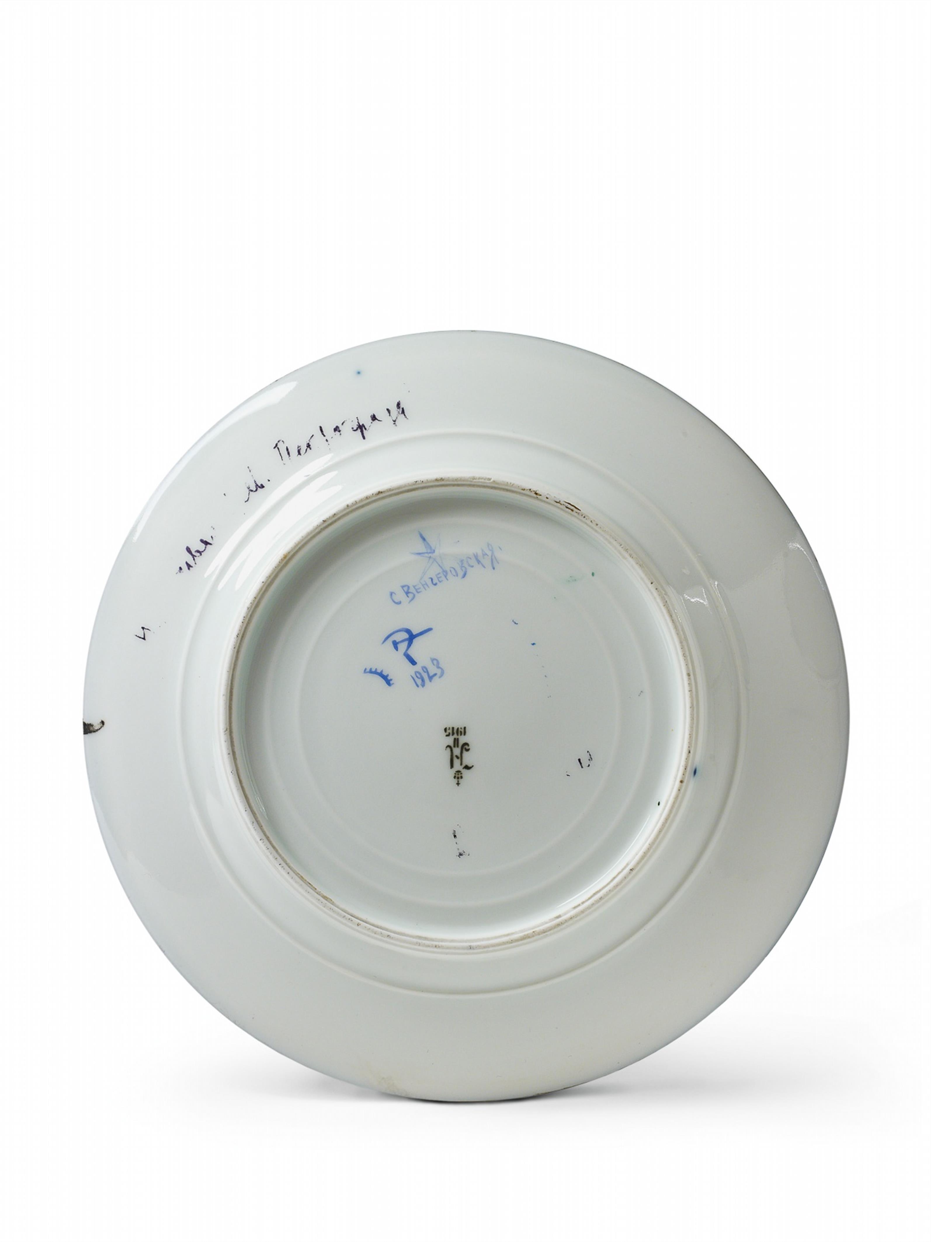 A porcelain plate, decorated in enamels with a winter battle scene. - image-2