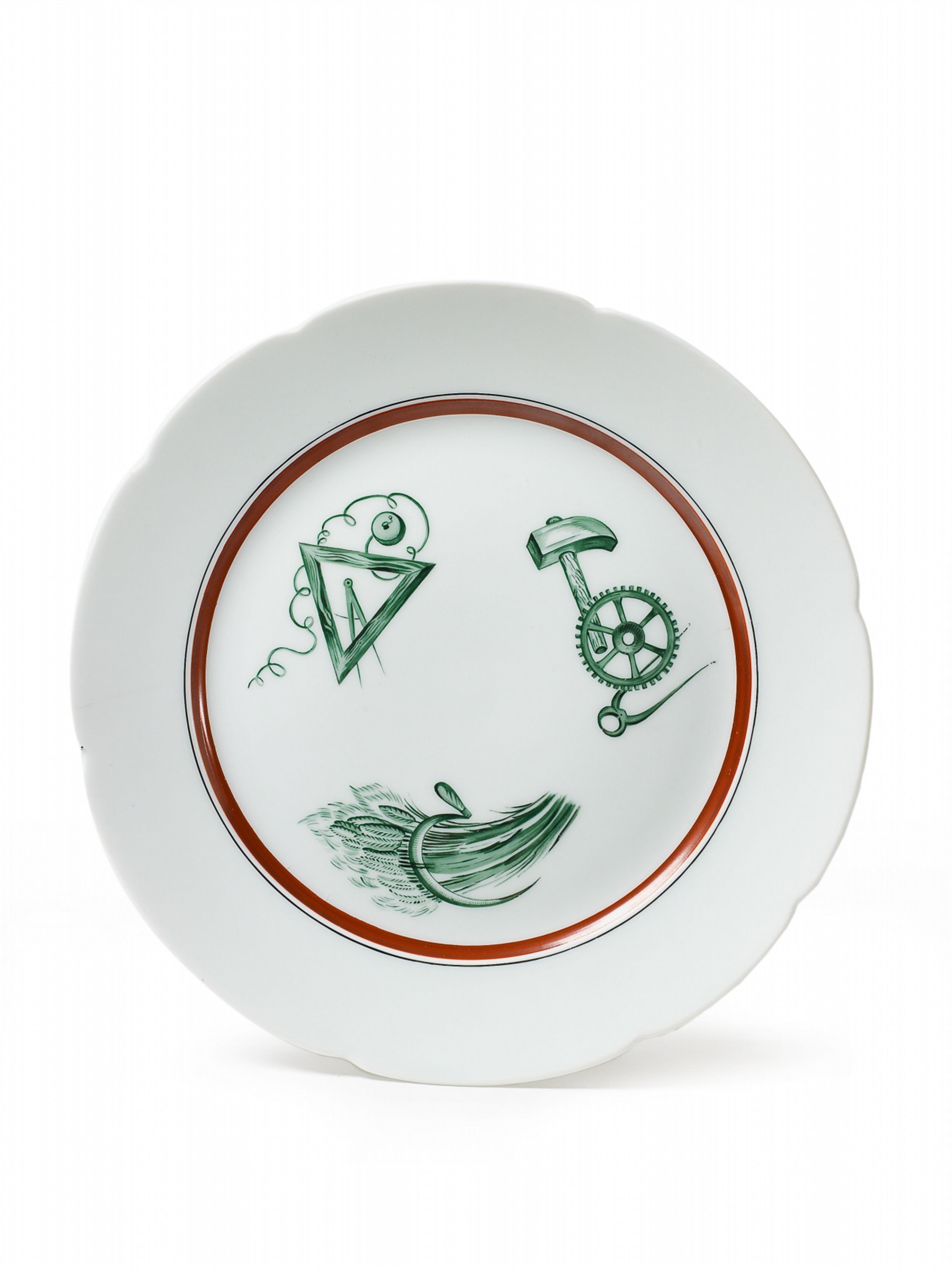 A shaped plate decorated in enamels with Soviet symbols representing various spheres of industry. - image-1