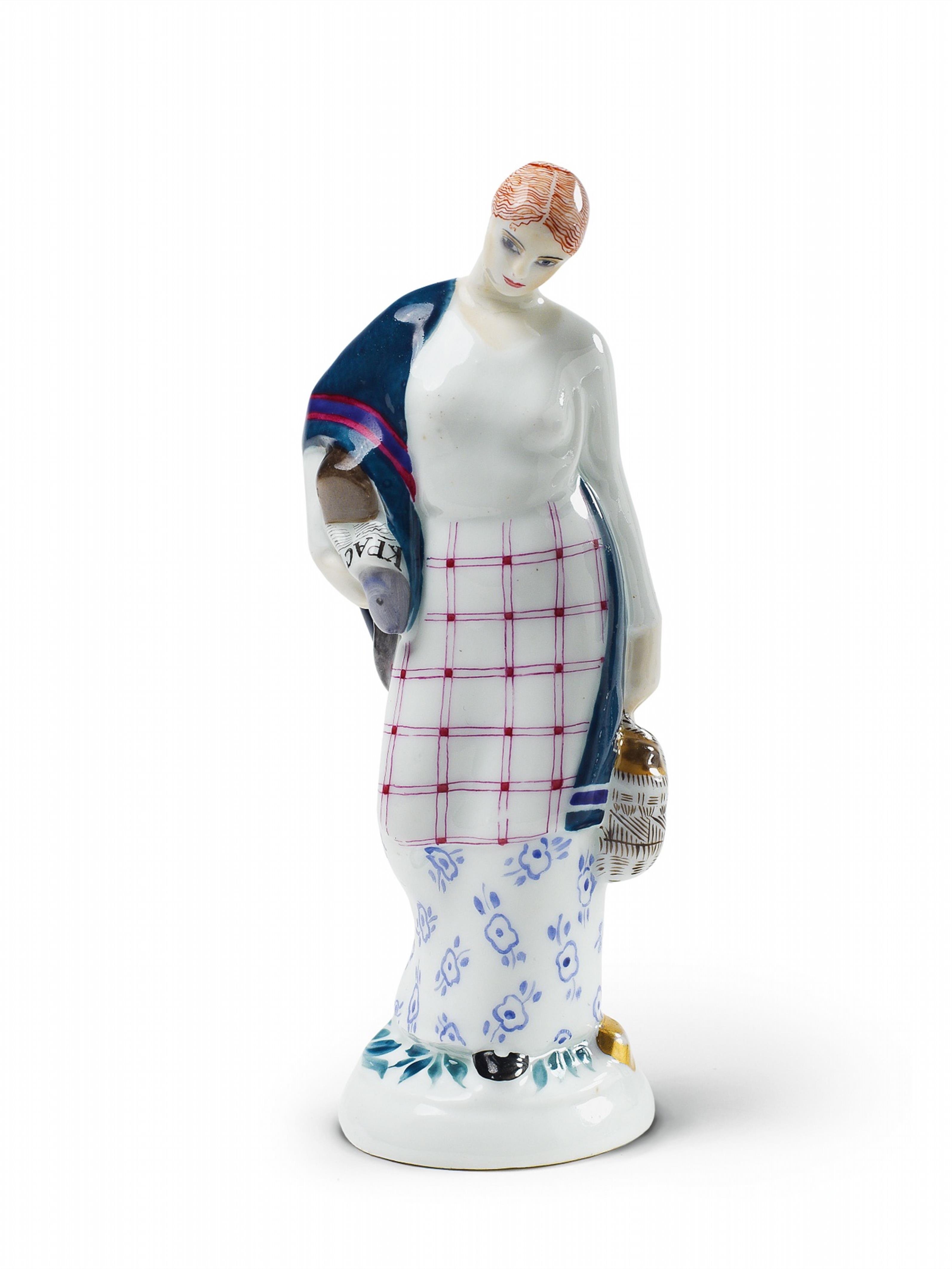 A porcelain figure of a young woman returning home from the market with her purchases. - image-1