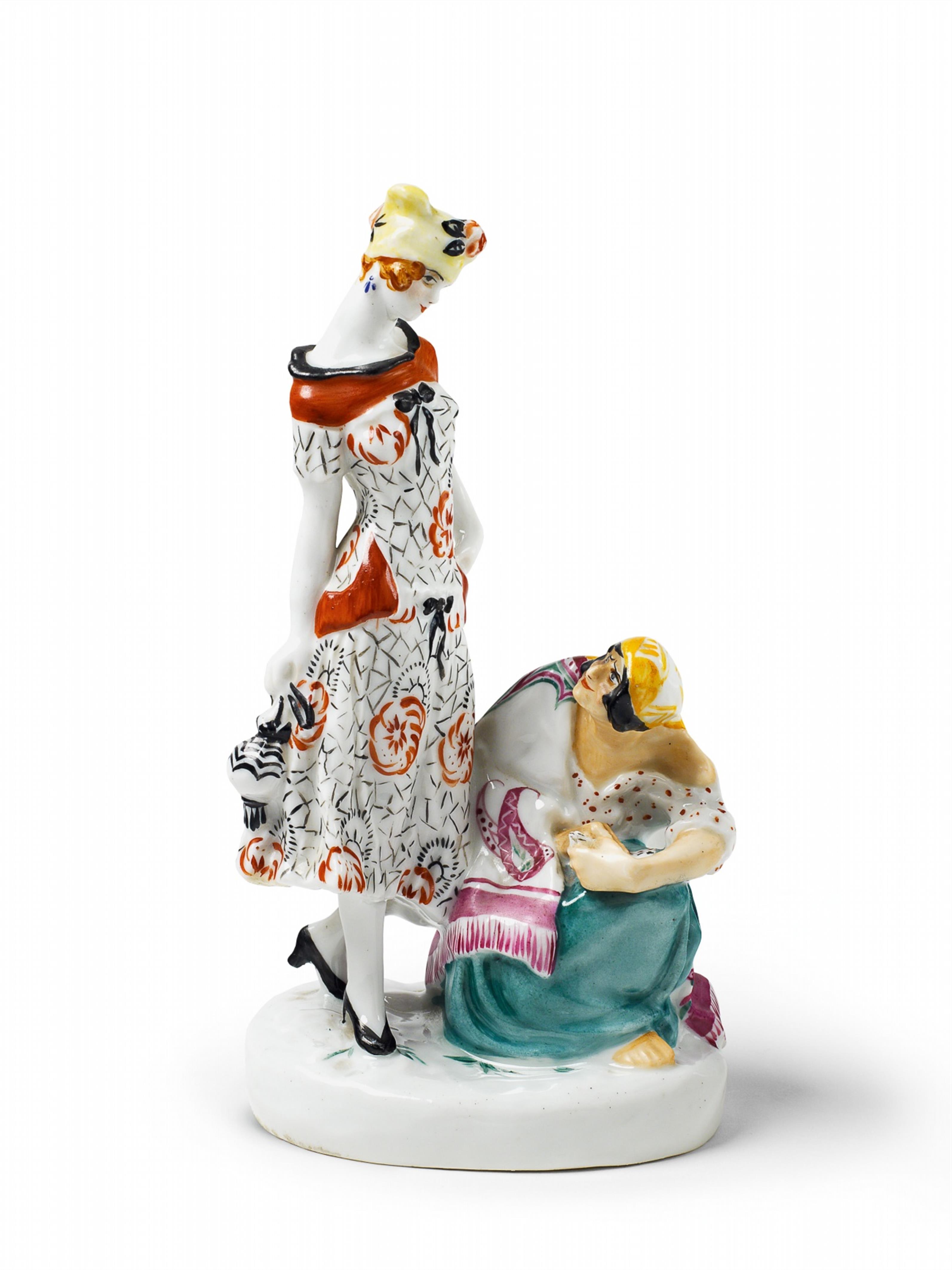 A porcelain group of a fashionably dressed young lady and a crouching fortune teller. - image-2