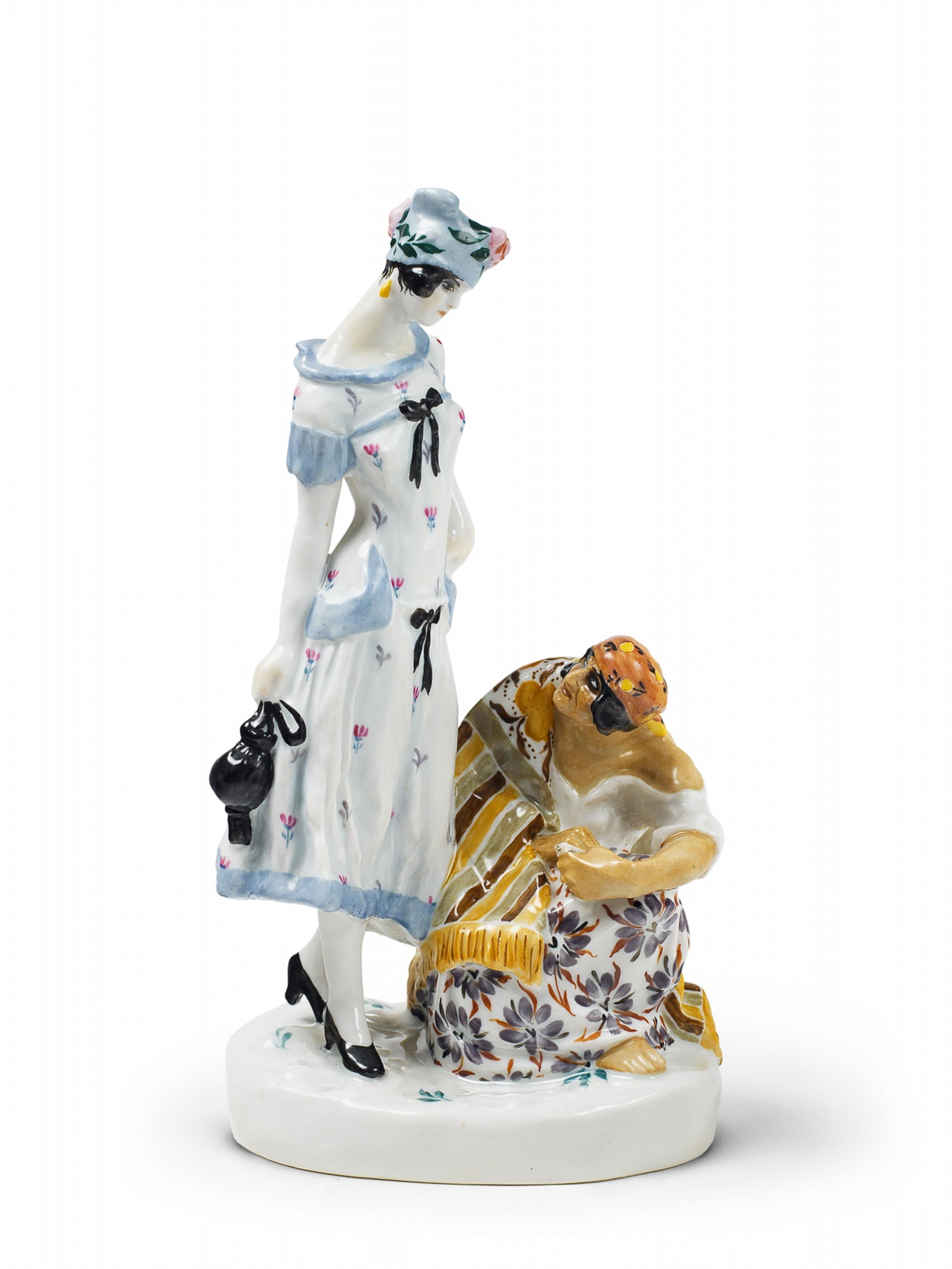 A porcelain group of a fashionably dressed young lady and a crouching fortune teller. - image-1