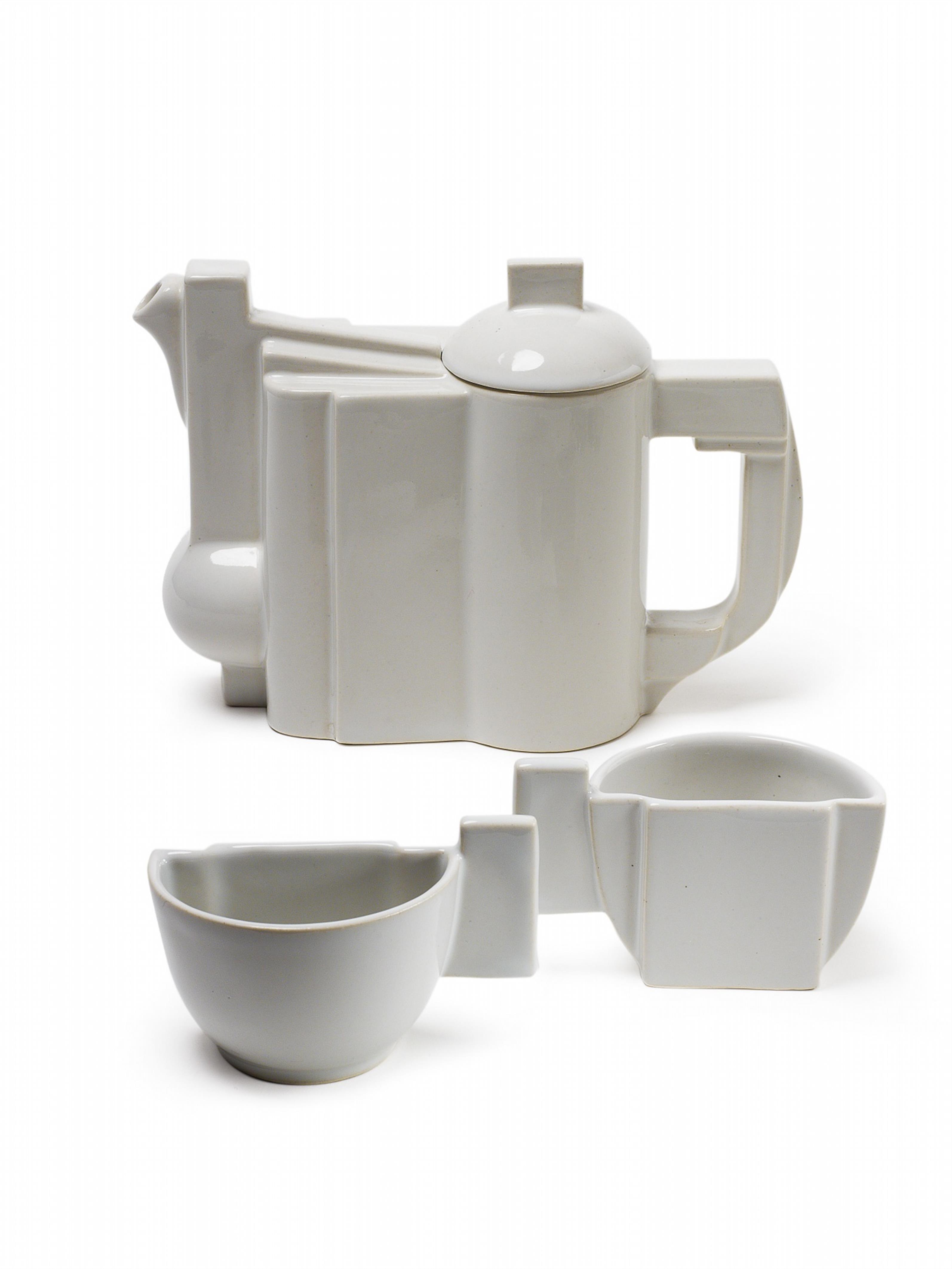 A Suprematist white porcelain jug and two cups. - image-1
