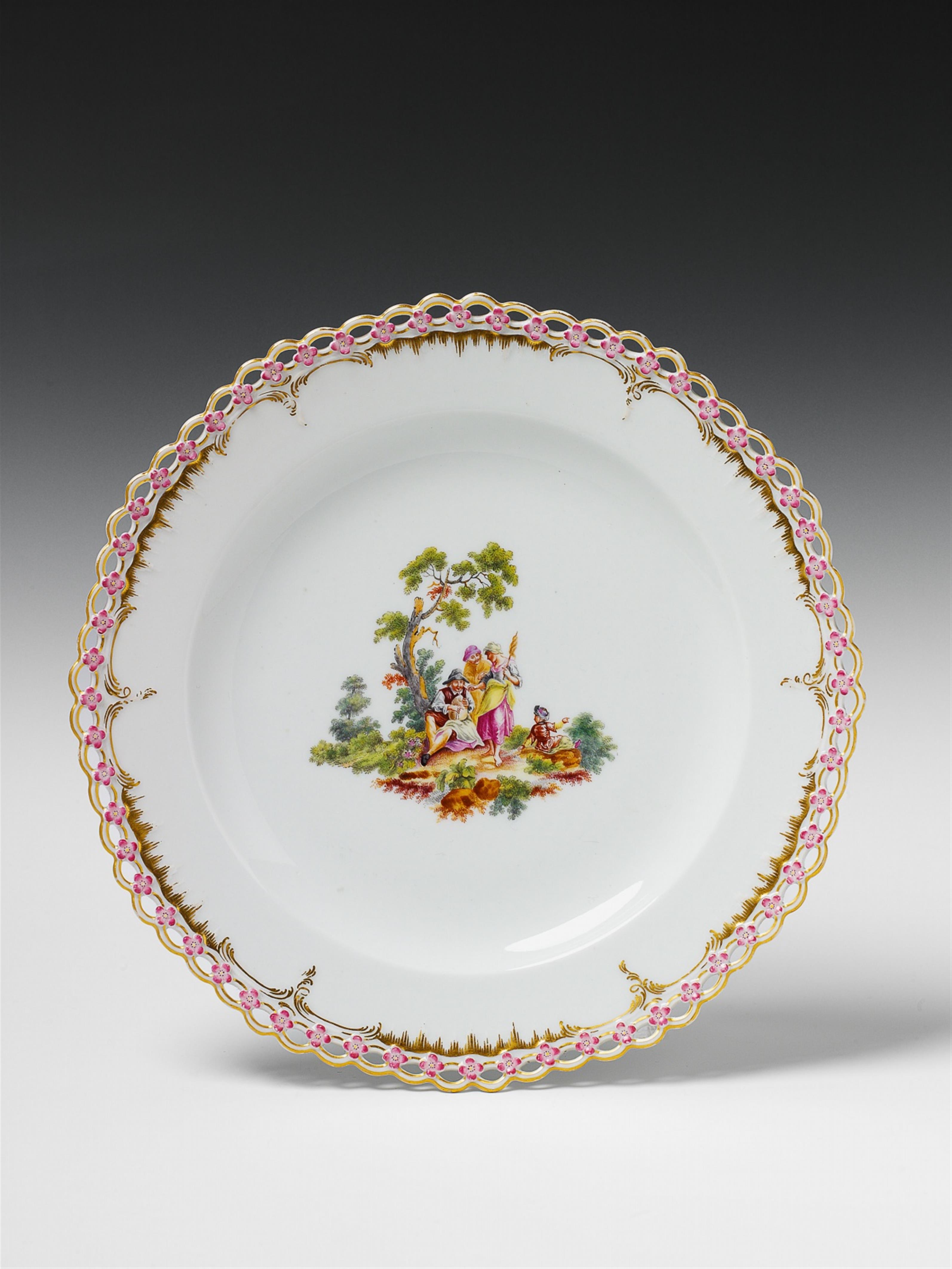 A Berlin KPM porcelain plate with a painted scene after Teniers. - image-1