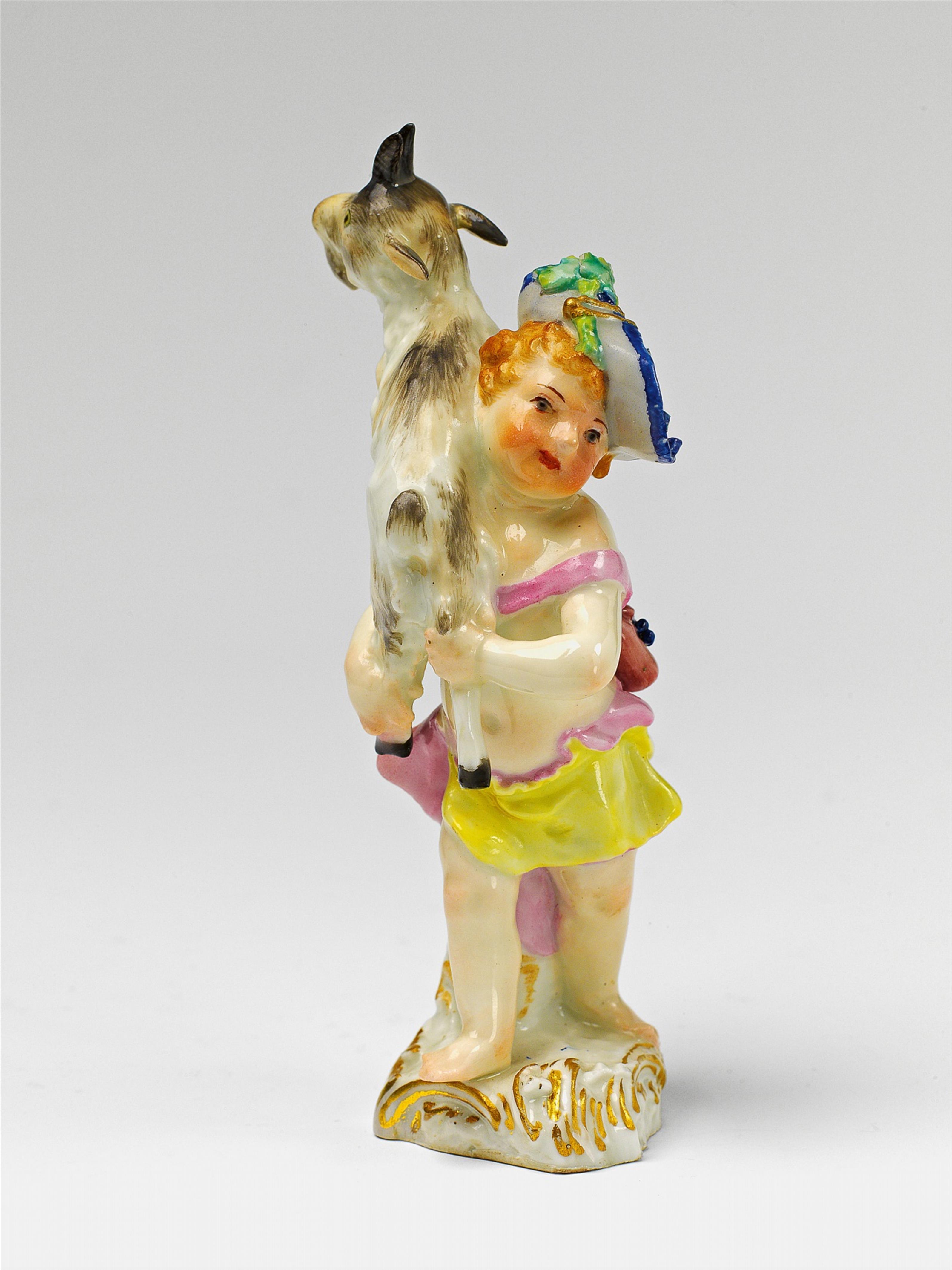 A Berlin KPM porcelain figure of a boy with a billy goat - image-1