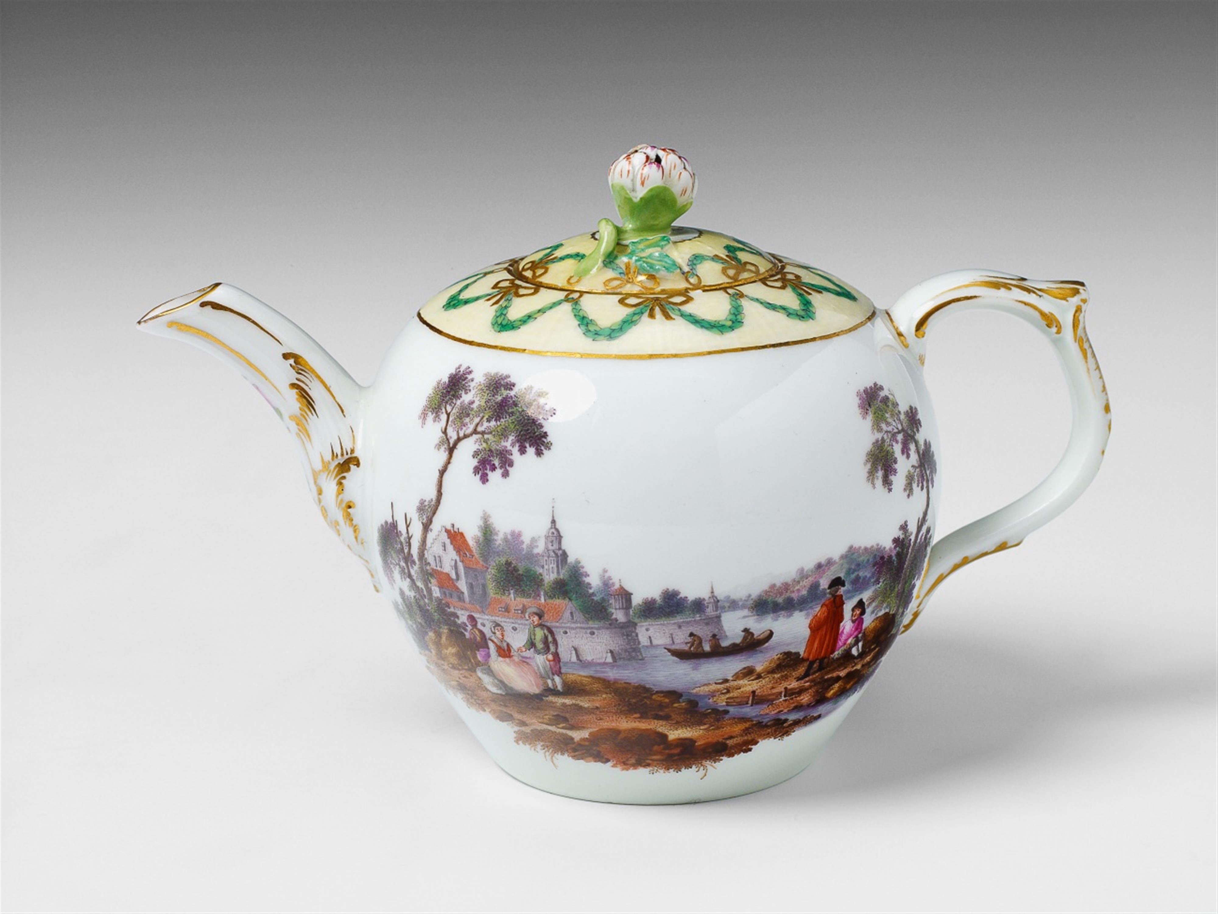 A Berlin KPM porcelain teapot with river landscapes and floral relief decor. - image-1