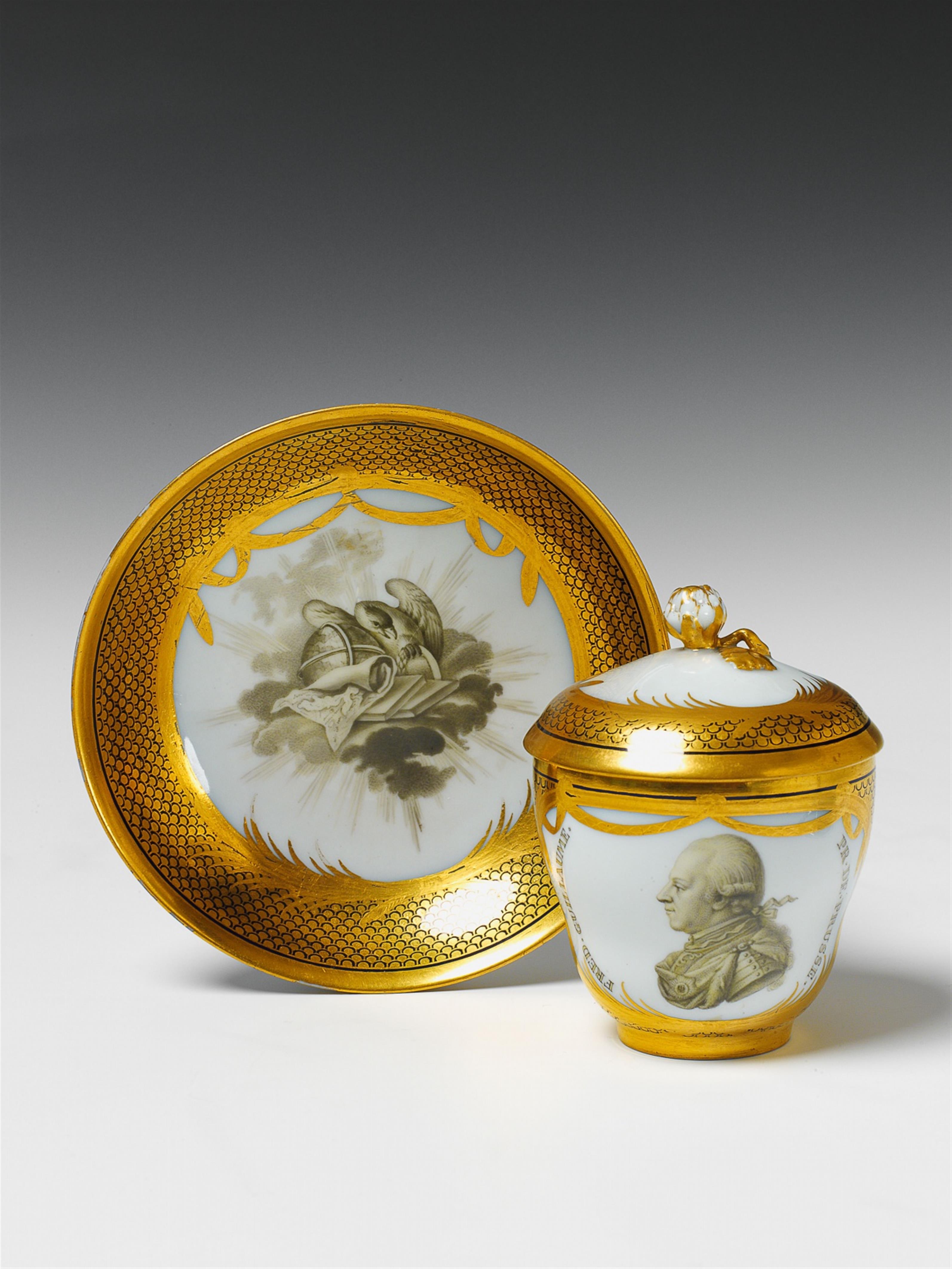 A Berlin KPM porcelain covered cup and saucer with a portrait of Frederick William. - image-1