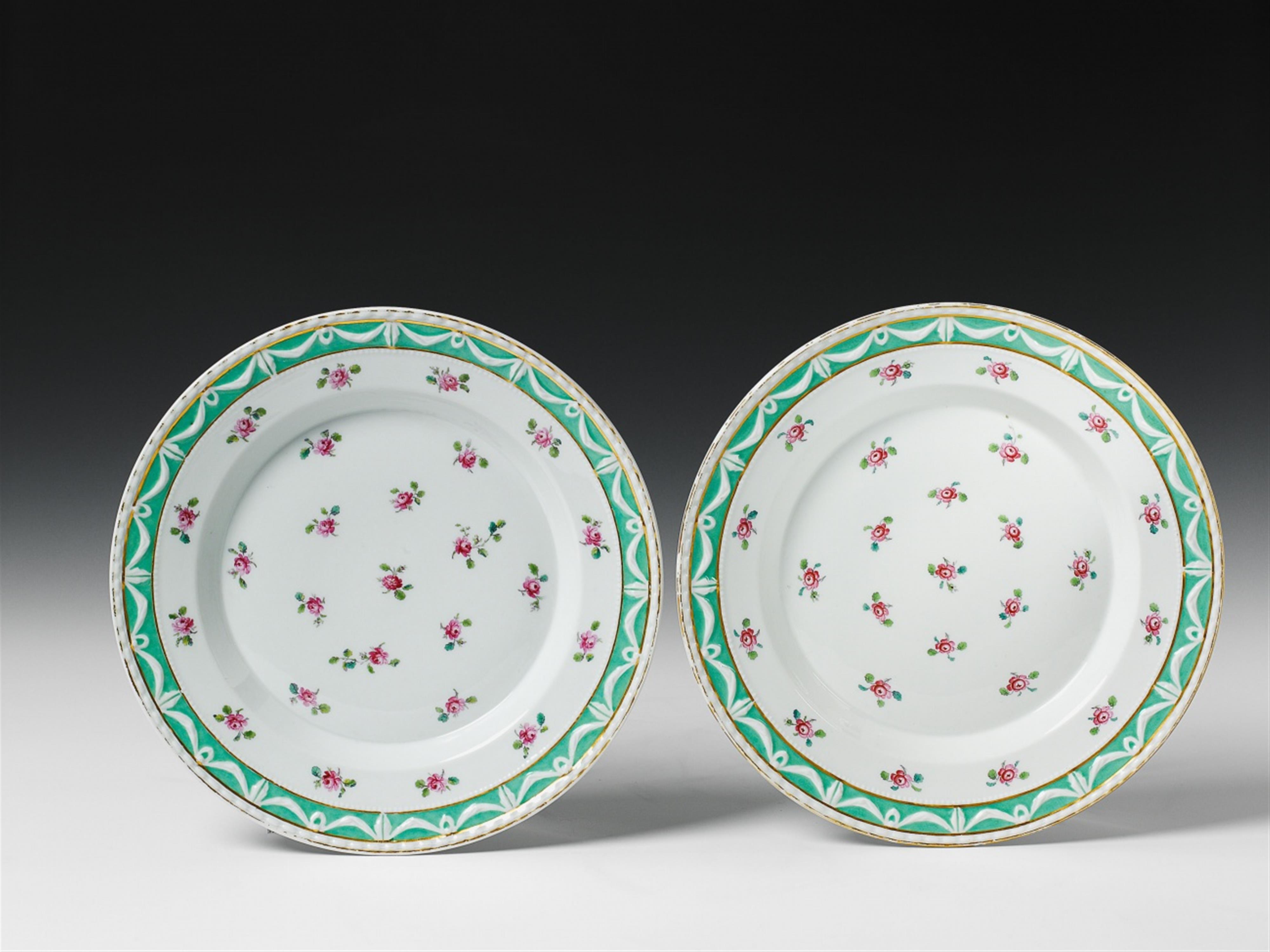 Two Berlin KPM plates with scattered roses. - image-1