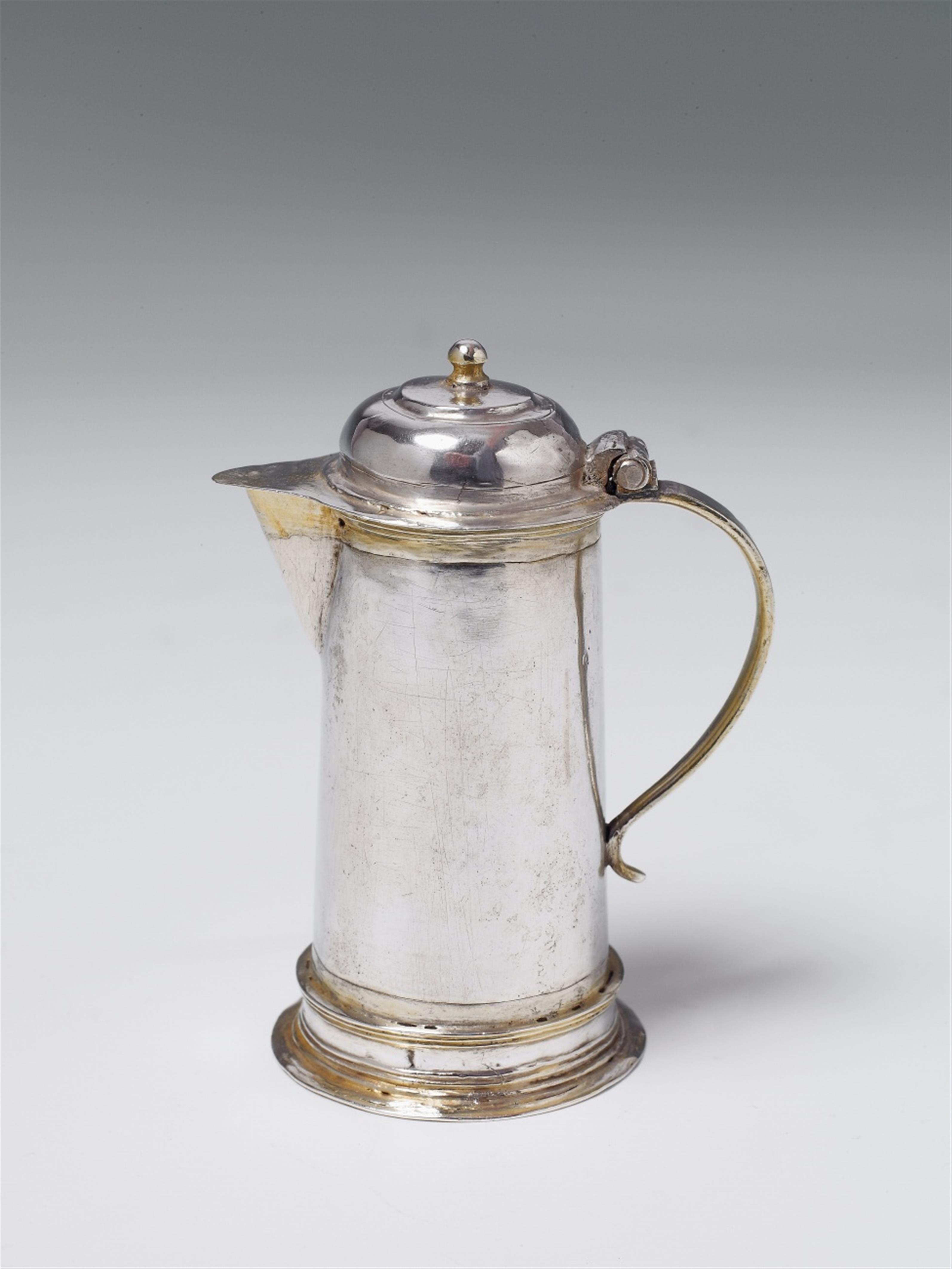 A Mülhausen miniature silver partially gilt pitcher. With a small restoration to the hinge. Marks of Martin Gisler, 1647 - 60. - image-1
